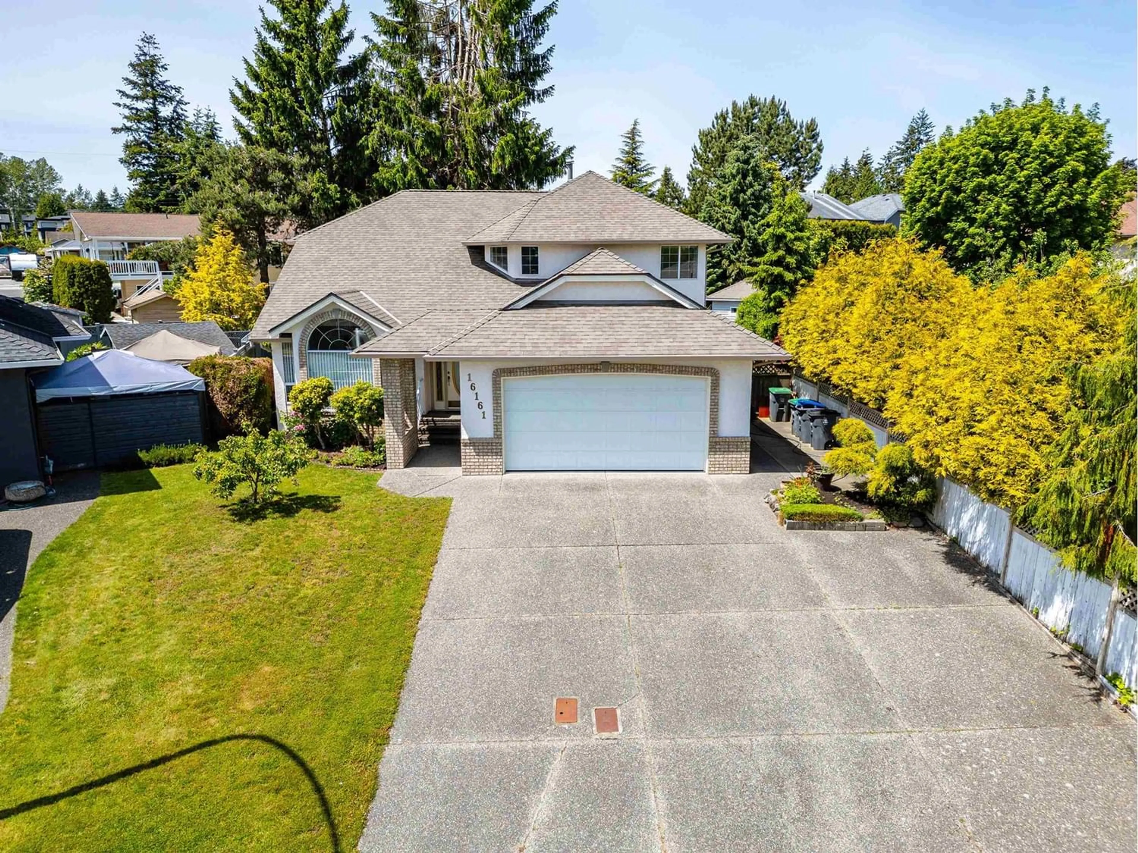 Frontside or backside of a home for 16161 14B AVENUE, Surrey British Columbia V4A9R3