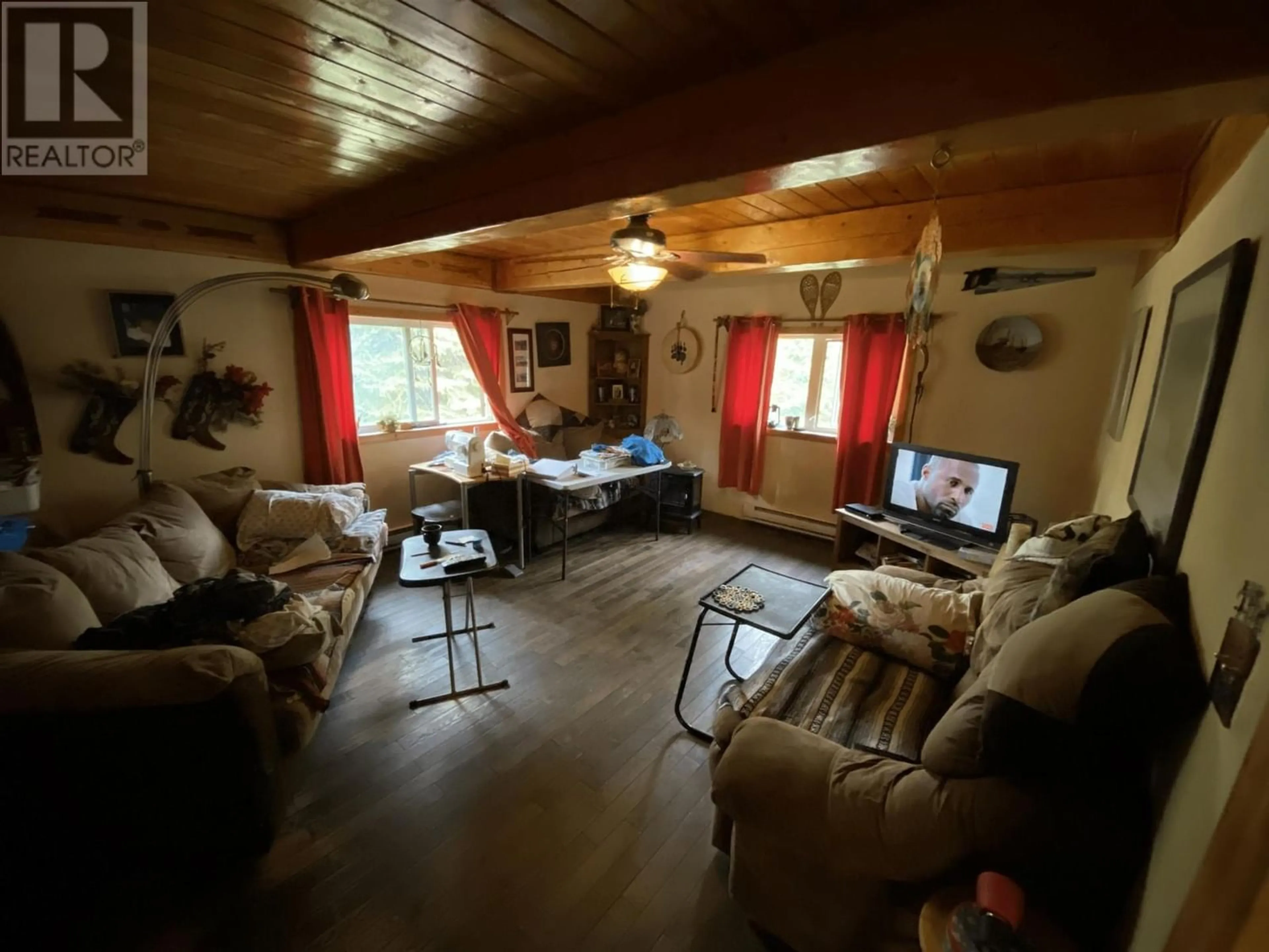 Living room, wood floors for 23938 UPPER HALFWAY ROAD, Fort St. John British Columbia V0C1H0