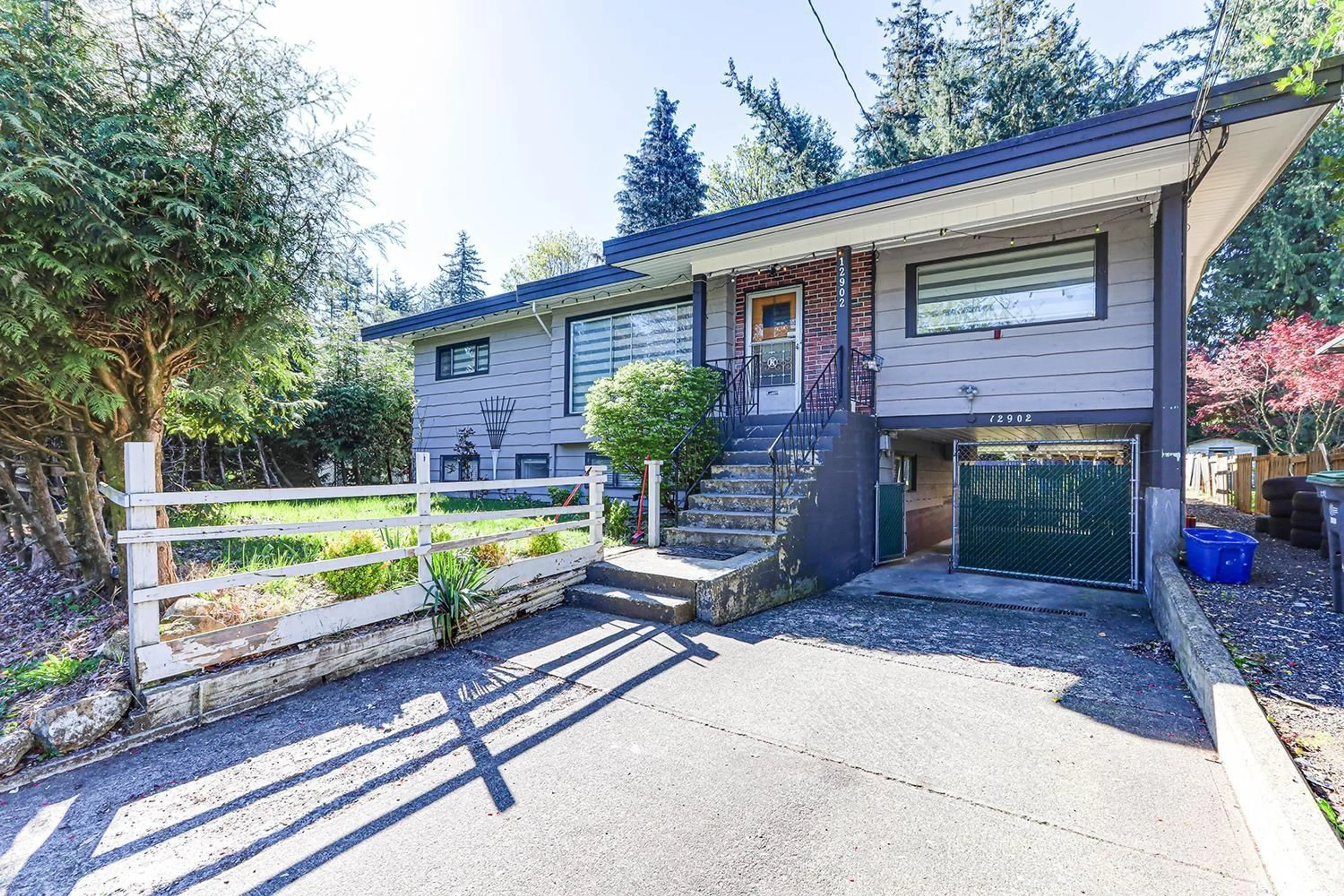 Frontside or backside of a home for 12902 106 AVENUE, Surrey British Columbia V3T2B8