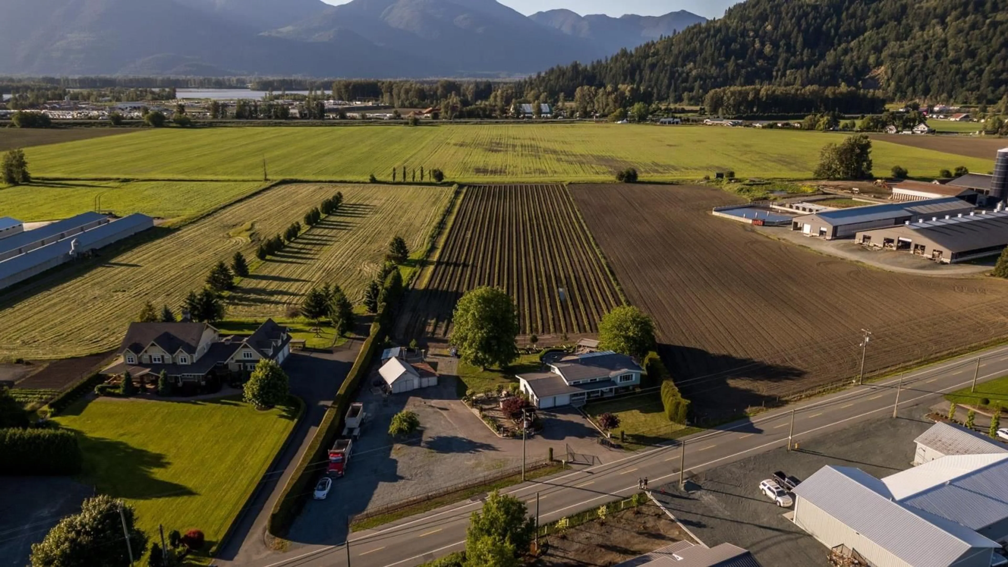 A pic from exterior of the house or condo, the fenced backyard for 42505 YALE ROAD, Chilliwack British Columbia V2R4J4