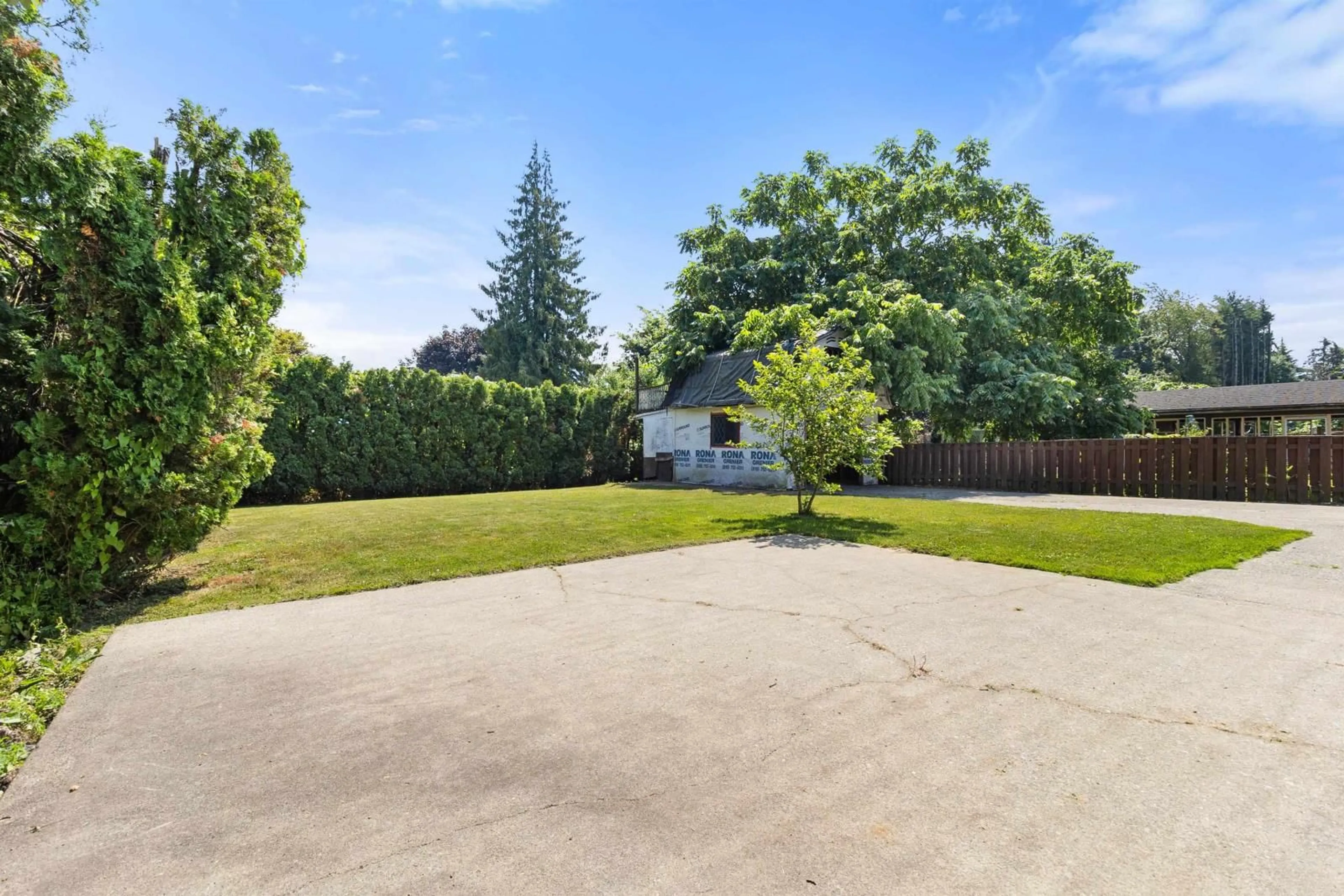 Frontside or backside of a home, the fenced backyard for 9790 CARLETON STREET, Chilliwack British Columbia V2P6E3