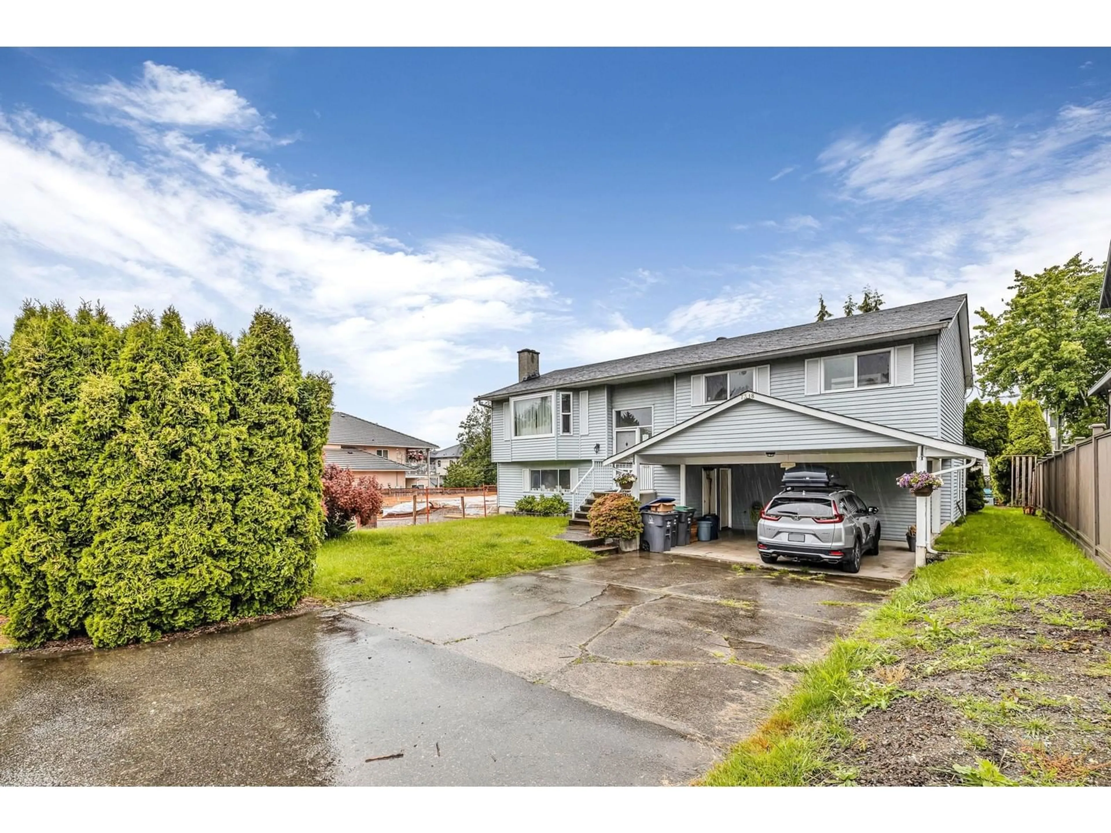 Frontside or backside of a home for 7318 145 STREET, Surrey British Columbia V3S2Y3