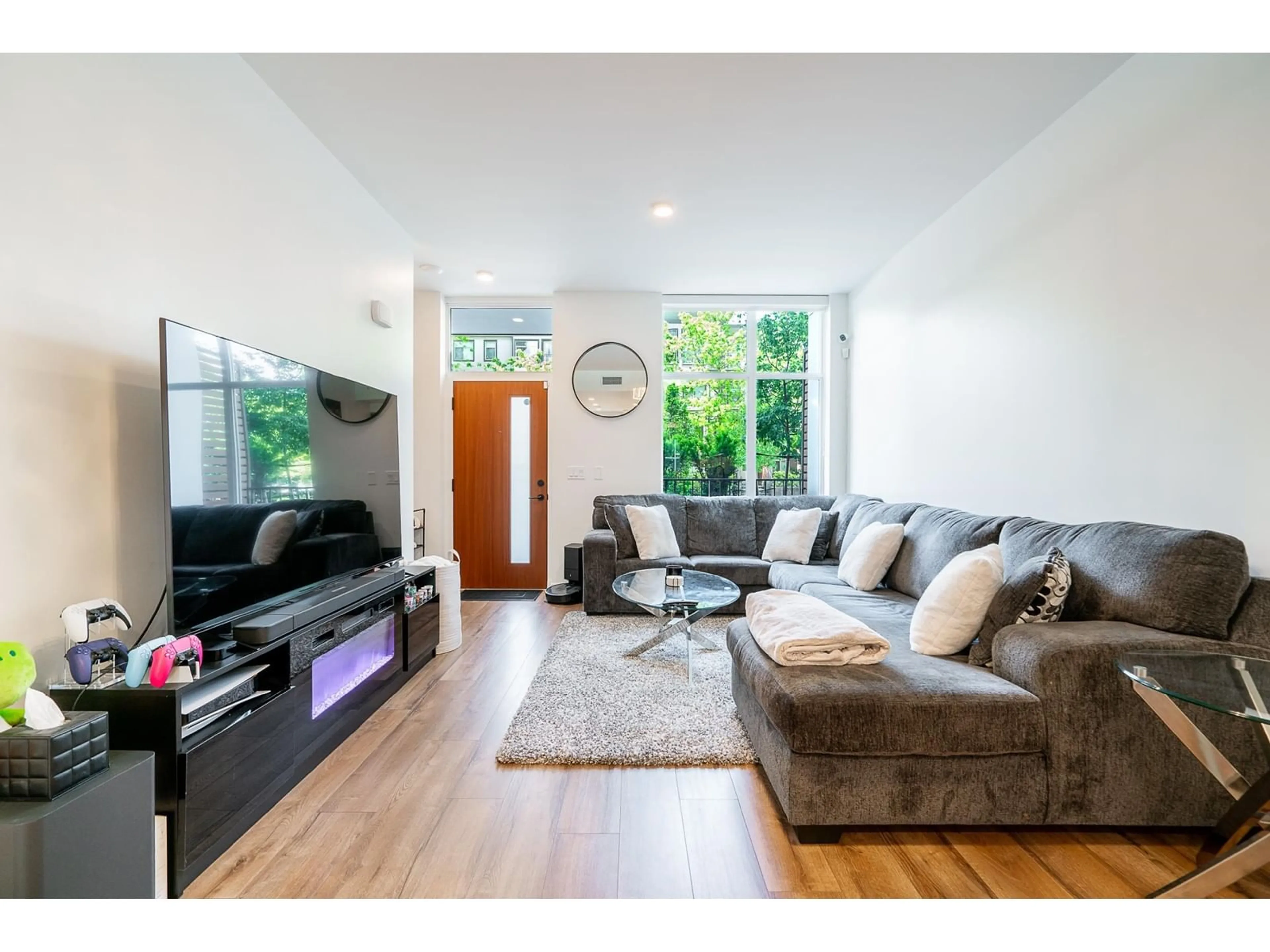 Living room with furniture, wood/laminate floor for TH14 - 10468 UNIVERSITY, Surrey British Columbia V3T0S6