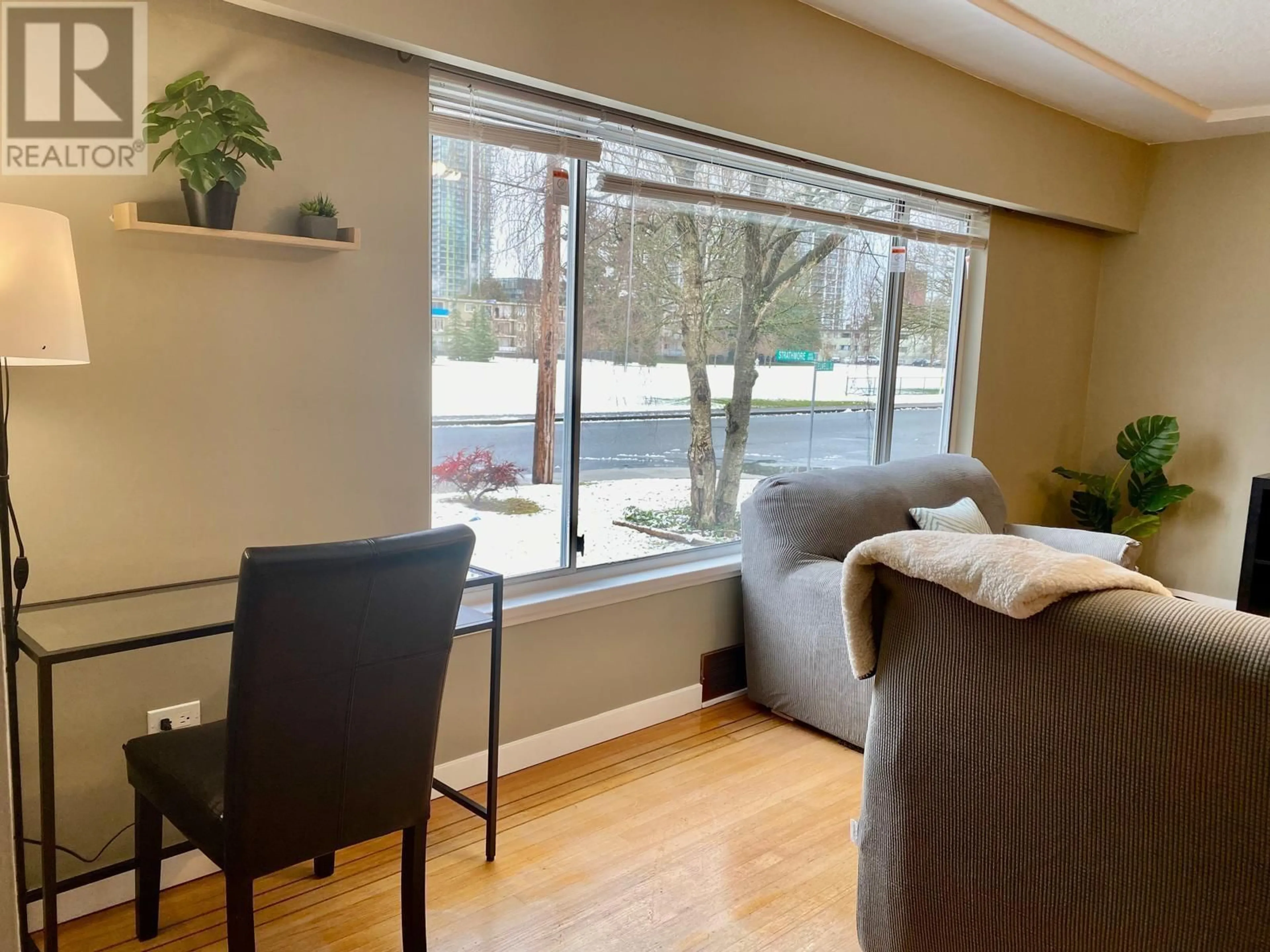 Living room with furniture, wood/laminate floor for 7433 ELWELL STREET, Burnaby British Columbia V5E1L3