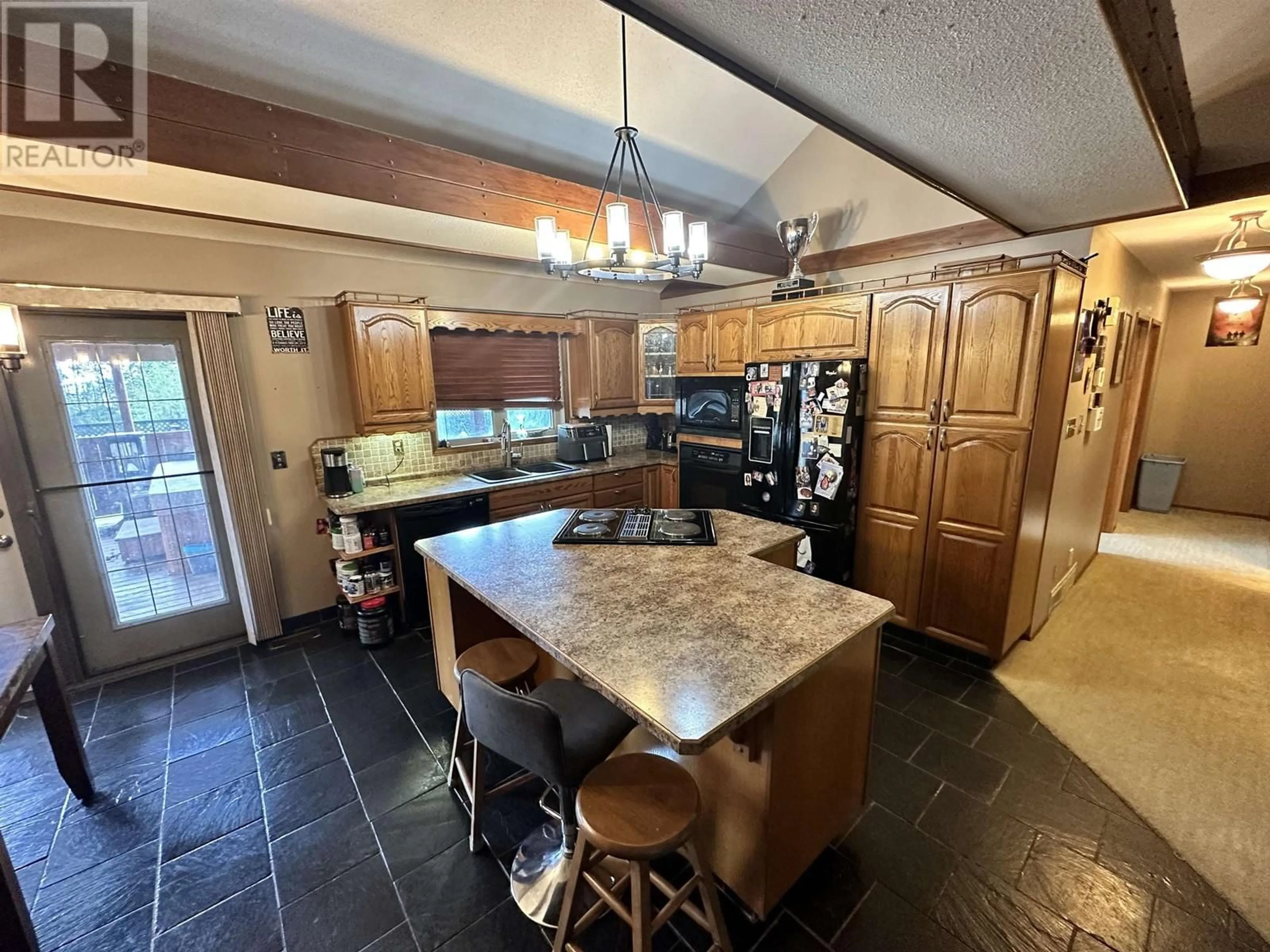 Kitchen, wood floors, cottage for 5516 MINNAKER CRESCENT, Fort Nelson British Columbia V0C1R0