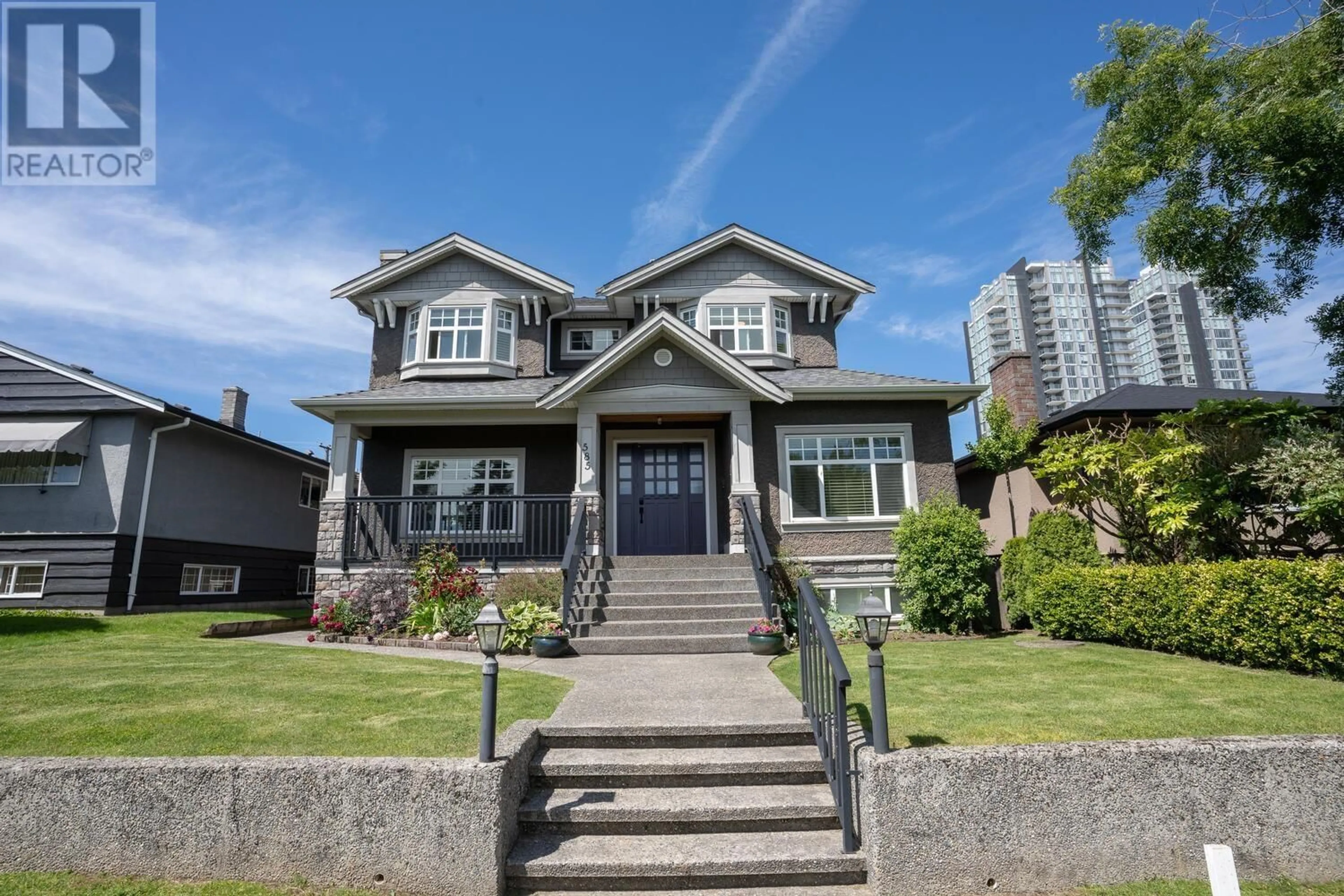 Frontside or backside of a home for 585 W 60TH AVENUE, Vancouver British Columbia V6P1Z8