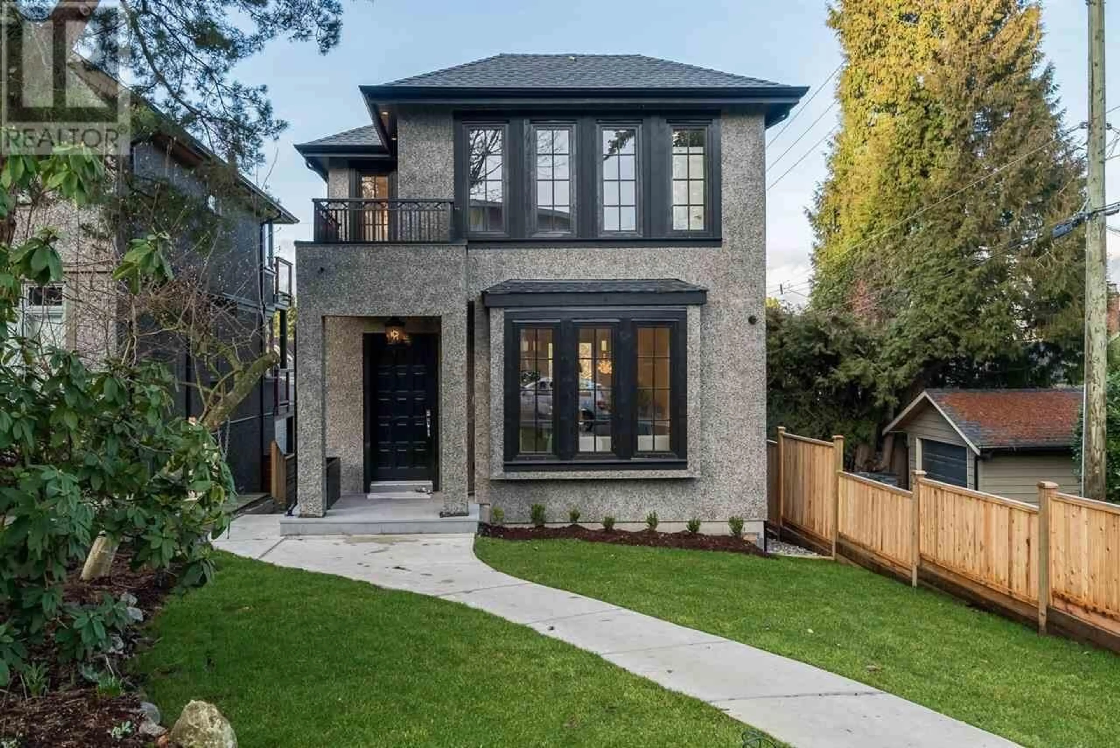 Home with brick exterior material for 3415 W 15TH AVENUE, Vancouver British Columbia V6R2Z2