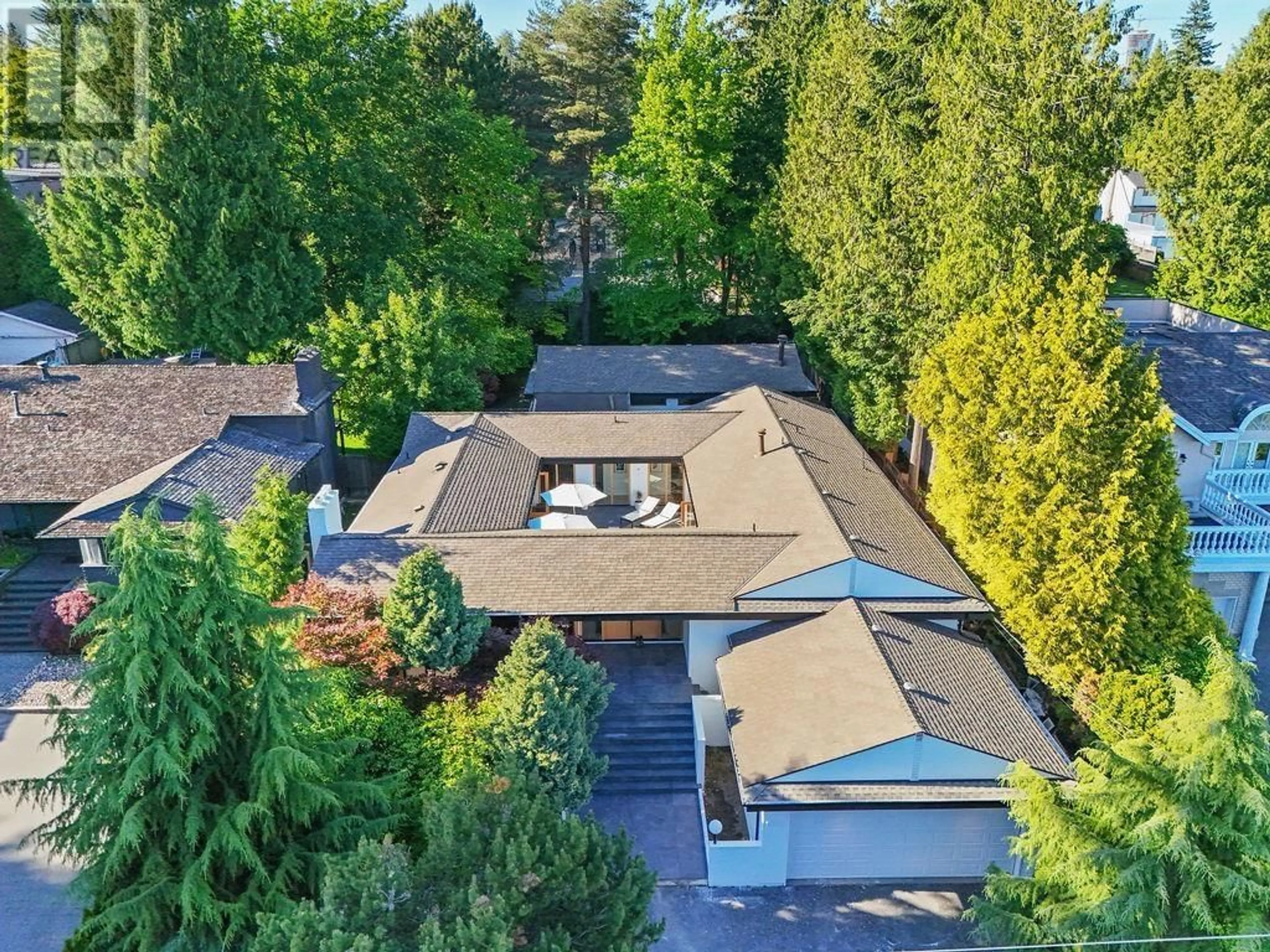 Frontside or backside of a home for 1055 W 57TH AVENUE, Vancouver British Columbia V6P1S6