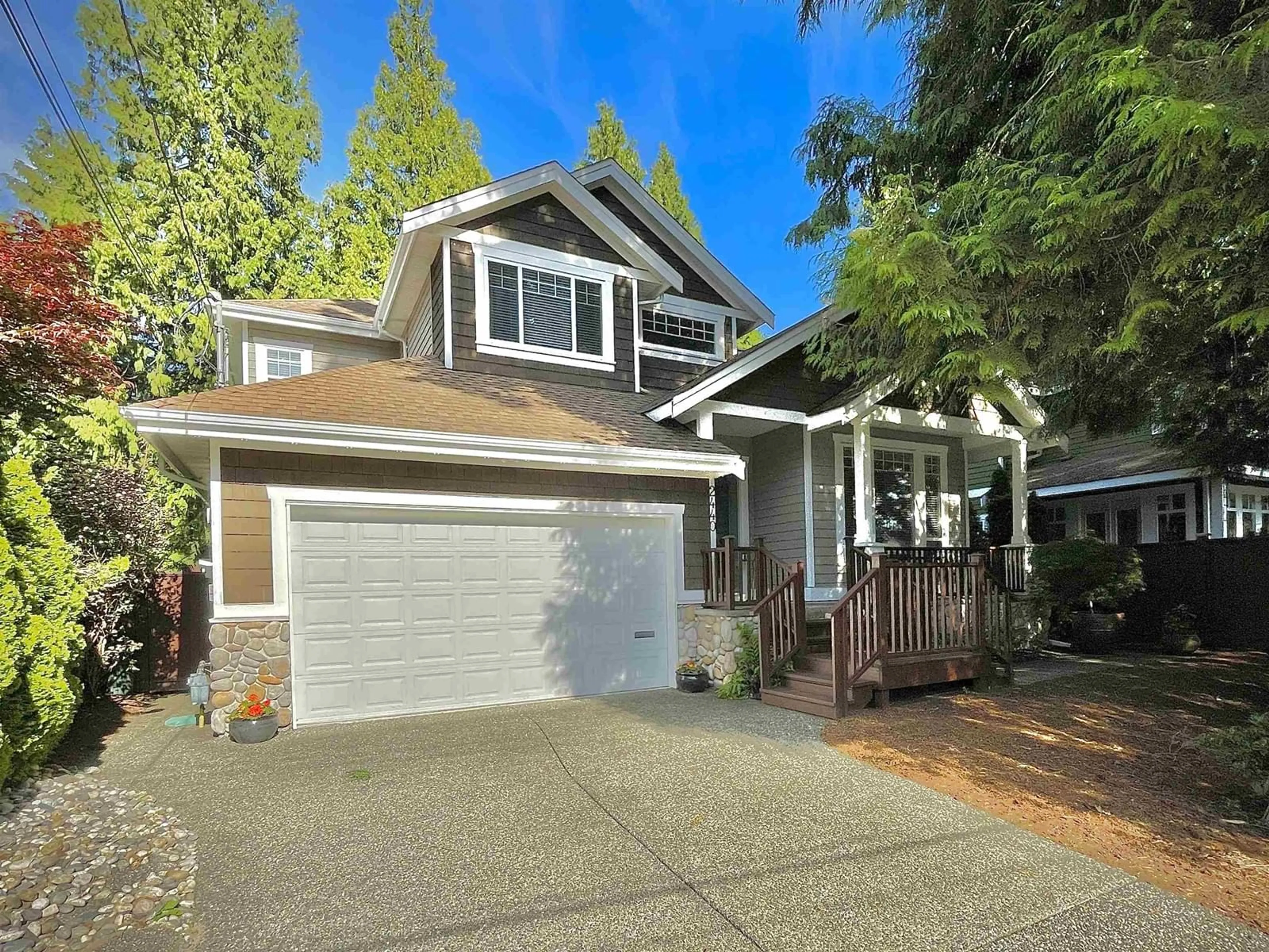 Frontside or backside of a home for 2440 124B STREET, Surrey British Columbia V4A3N6