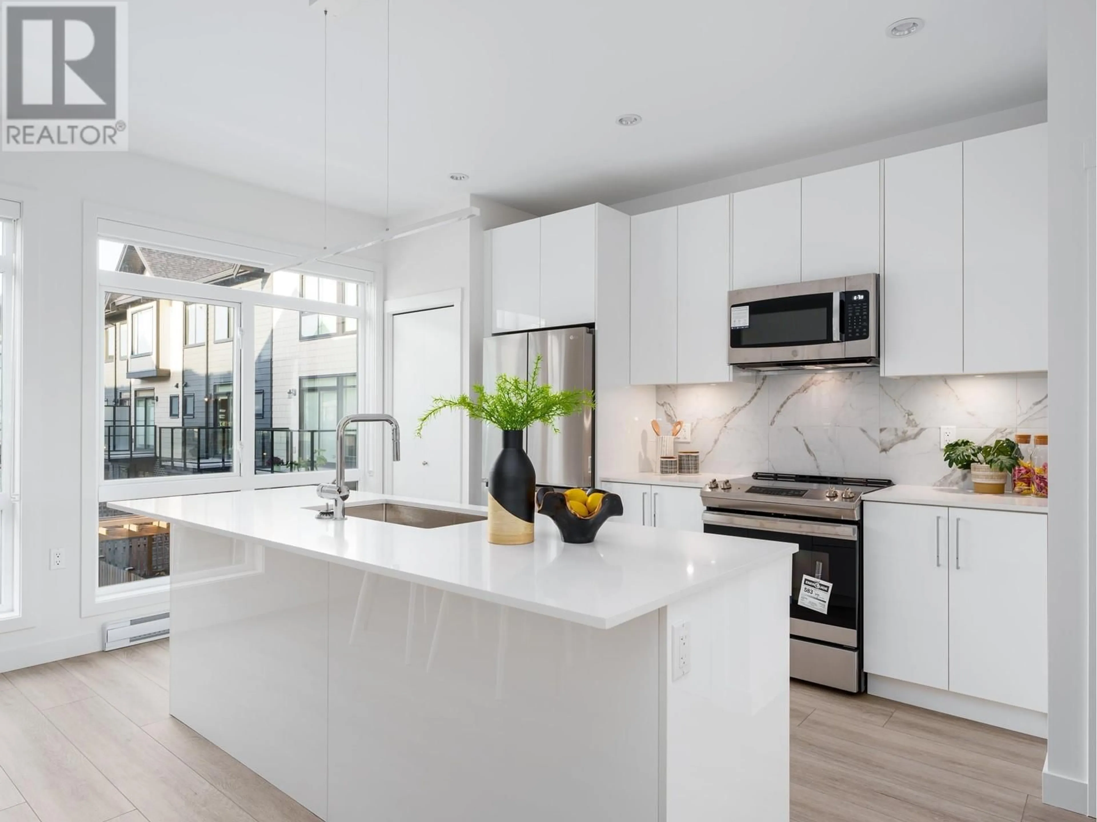 Open concept kitchen, ceramic/tile floor for 21 - 4337 BOUNDARY ROAD, Richmond British Columbia V6V1S8