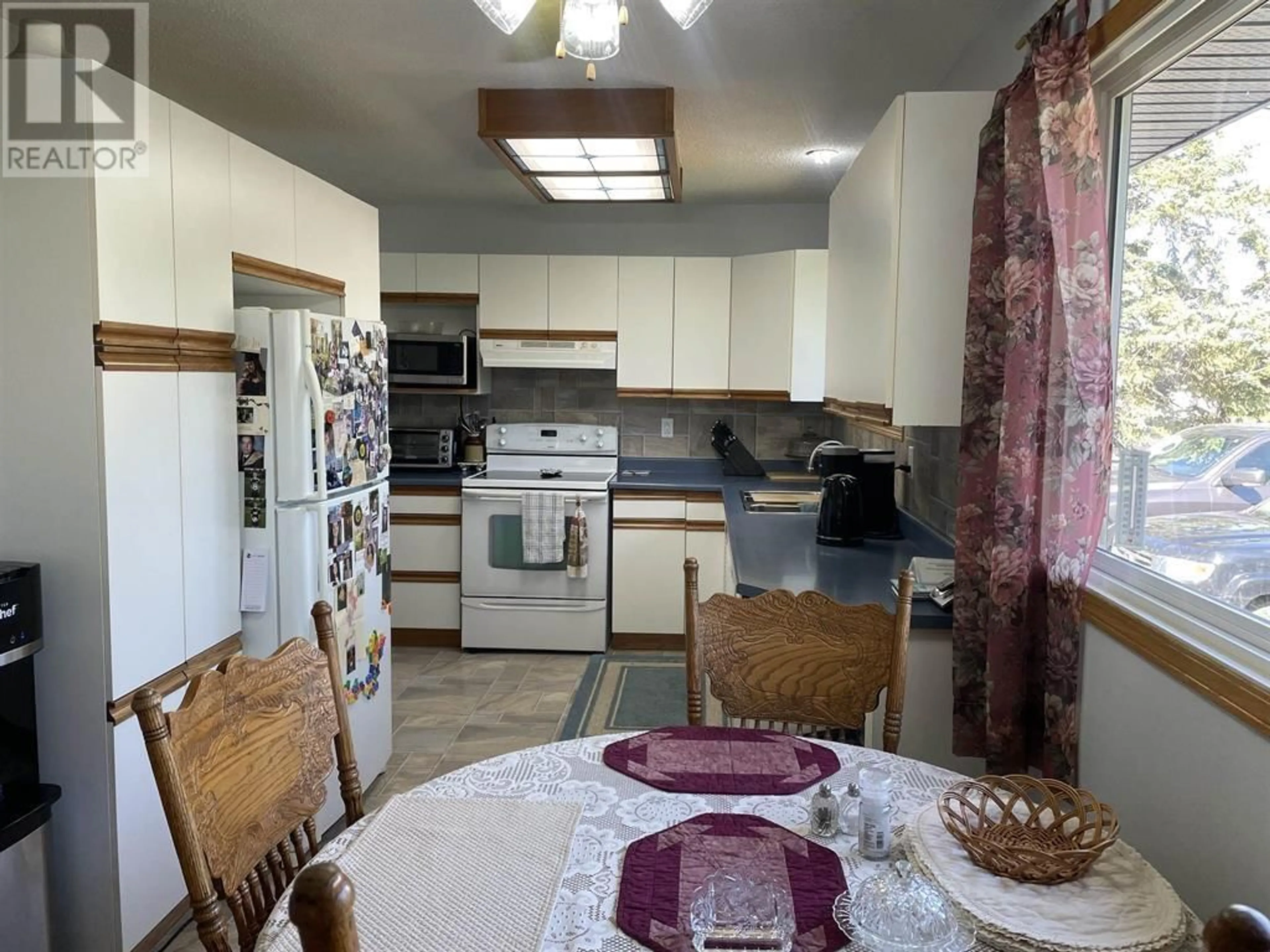 Standard kitchen, ceramic/tile floor for 5985 JADE ROAD, Fort St. John British Columbia V0C1C0