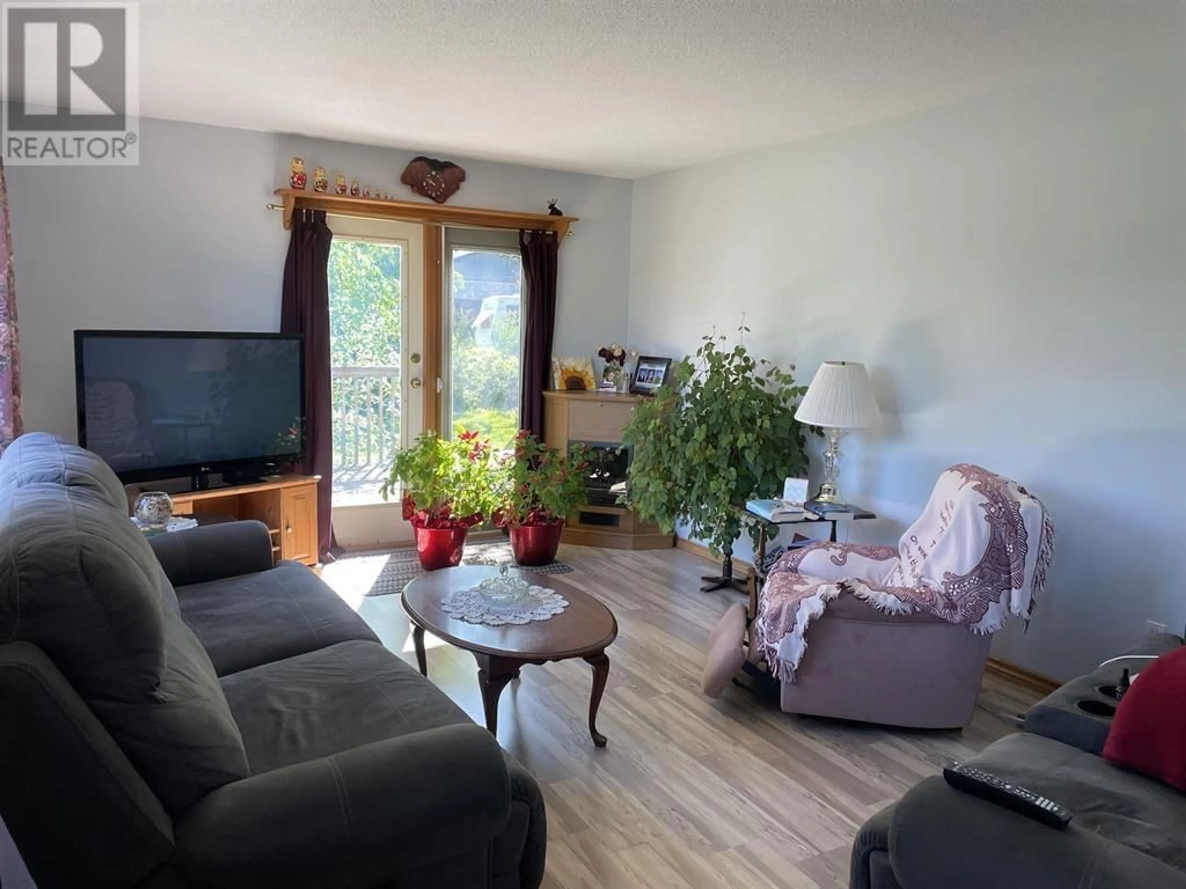 Living room with furniture, unknown for 5985 JADE ROAD, Fort St. John British Columbia V0C1C0