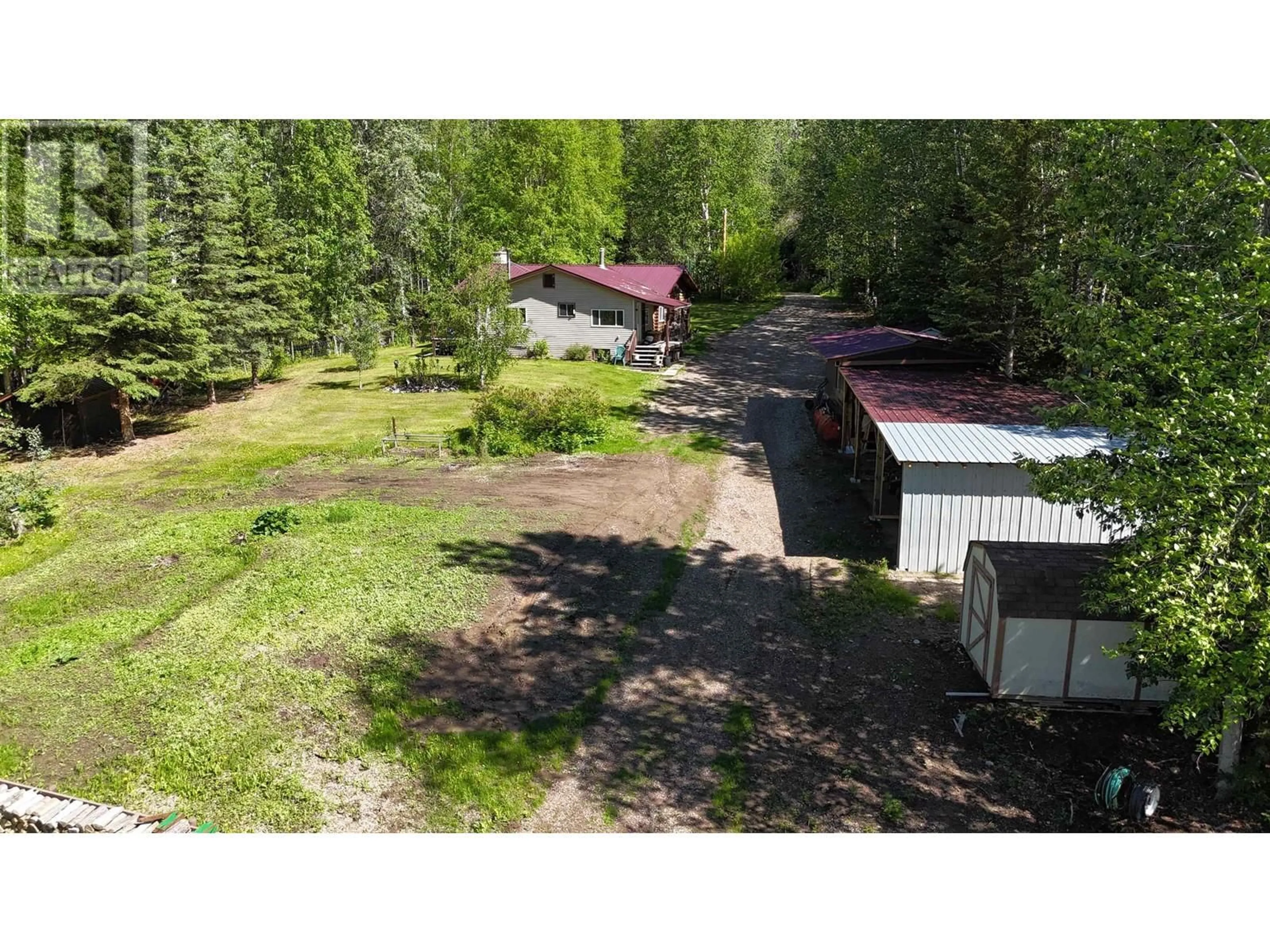 A pic from outside/outdoor area/front of a property/back of a property/a pic from drone, forest/trees view for 7639 OLD ALASKA HIGHWAY, Fort Nelson British Columbia V0C1R0