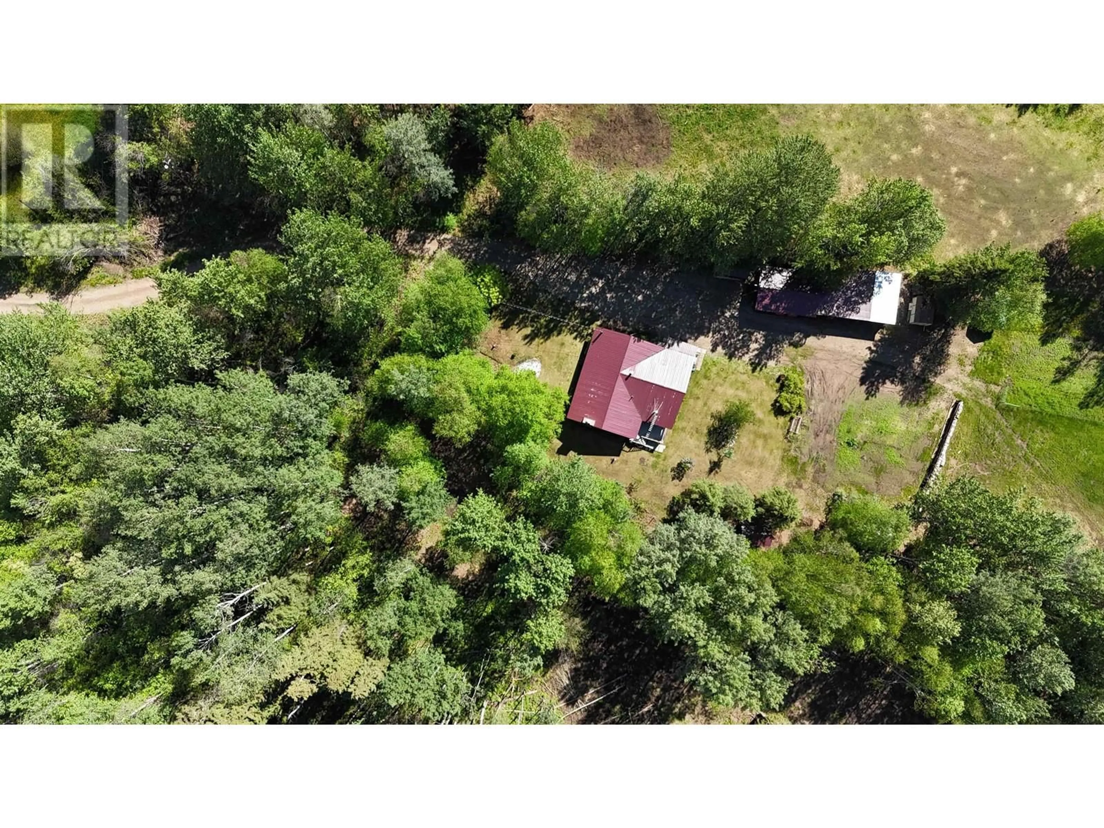 A pic from outside/outdoor area/front of a property/back of a property/a pic from drone, forest/trees view for 7639 OLD ALASKA HIGHWAY, Fort Nelson British Columbia V0C1R0
