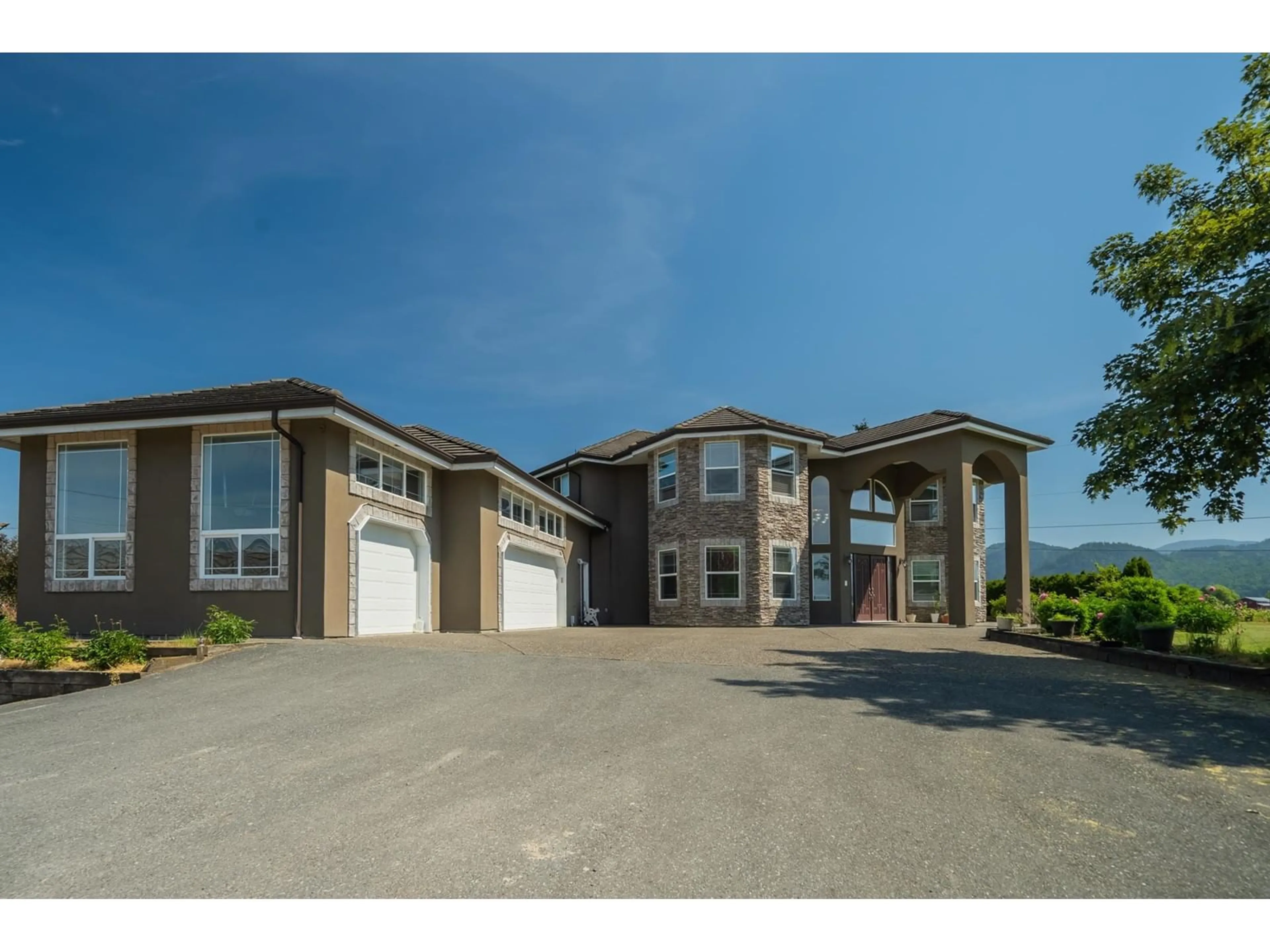 Frontside or backside of a home for 34173 TOWNSHIPLINE ROAD, Abbotsford British Columbia V3G1R1