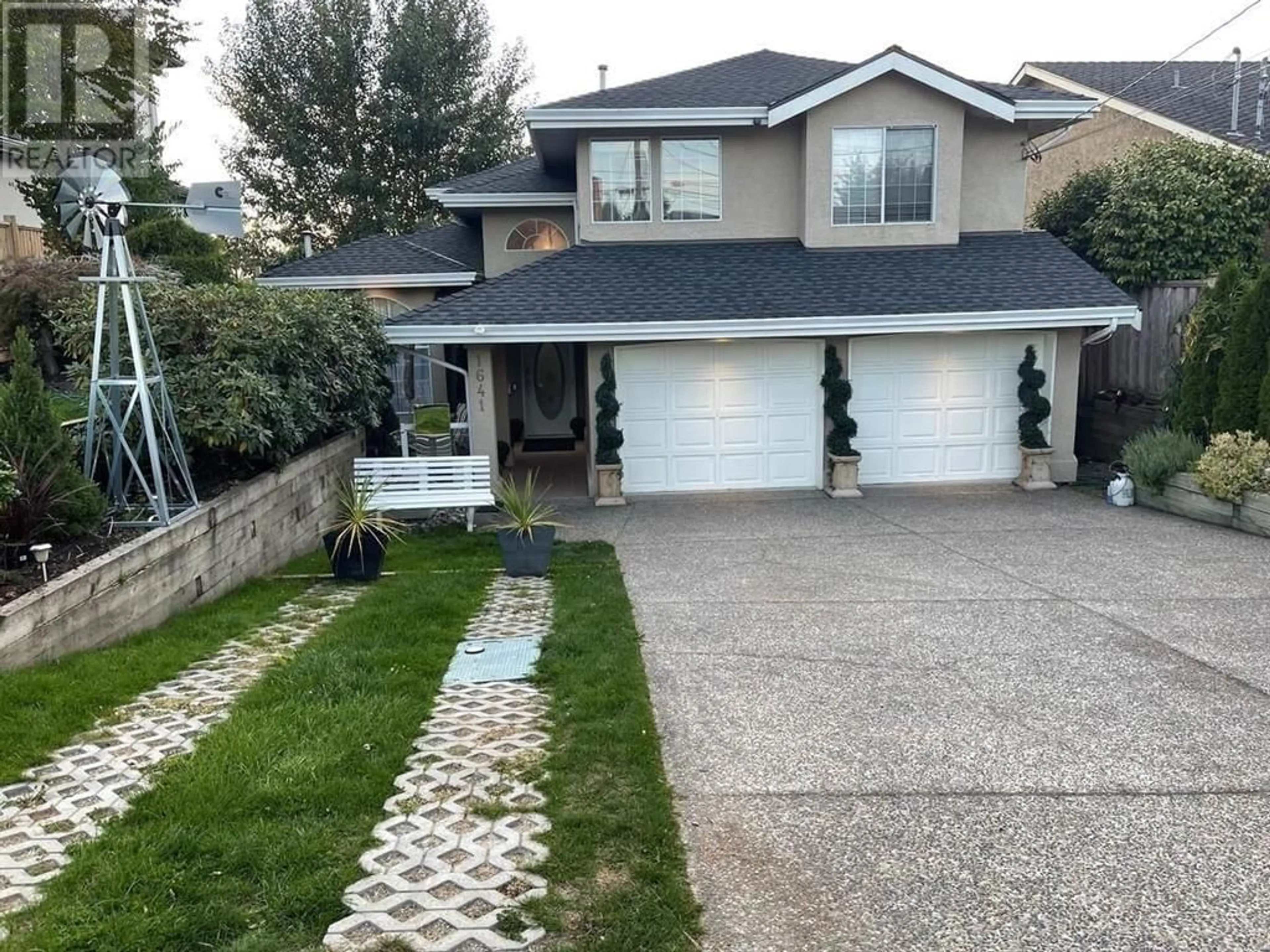 Frontside or backside of a home for 1641 53A STREET, Delta British Columbia V4M3G3