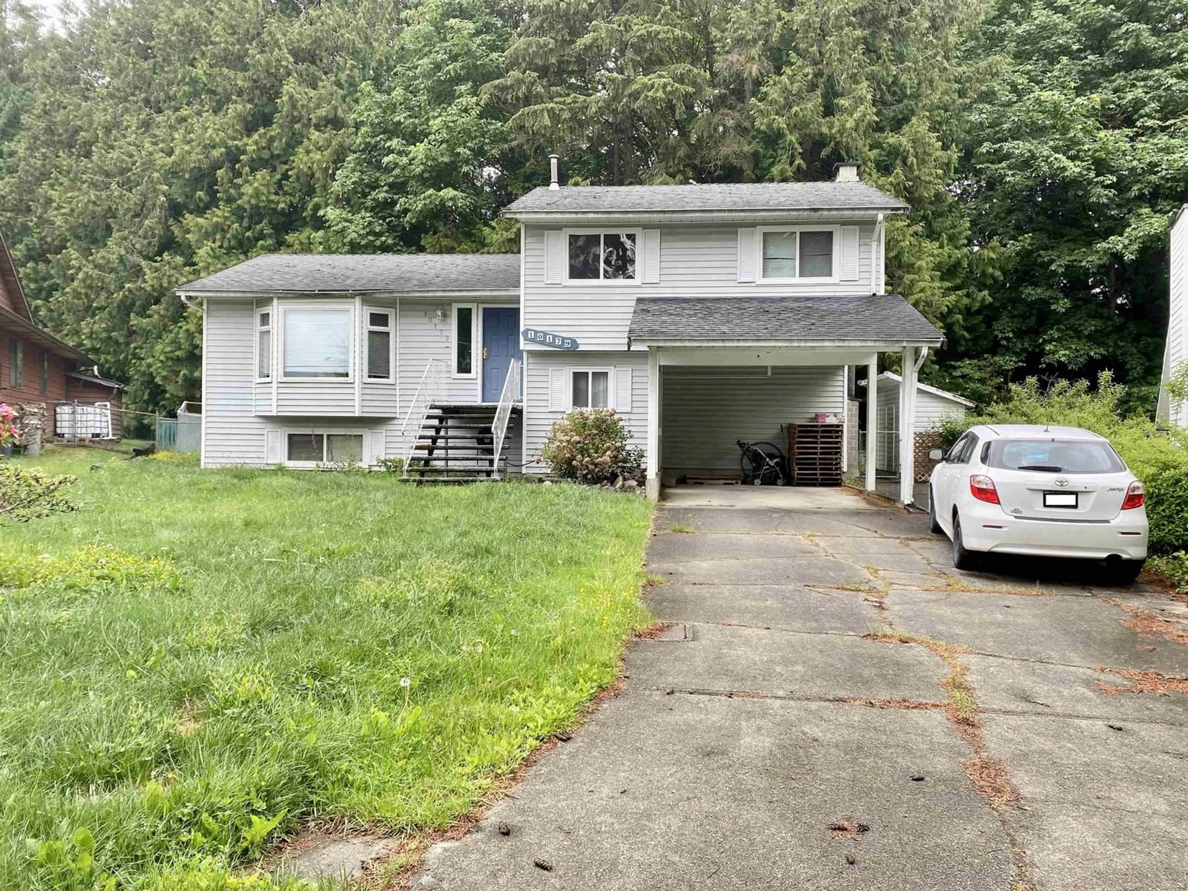 Home with vinyl exterior material, street for 10179 159A, Surrey British Columbia V4N2N7
