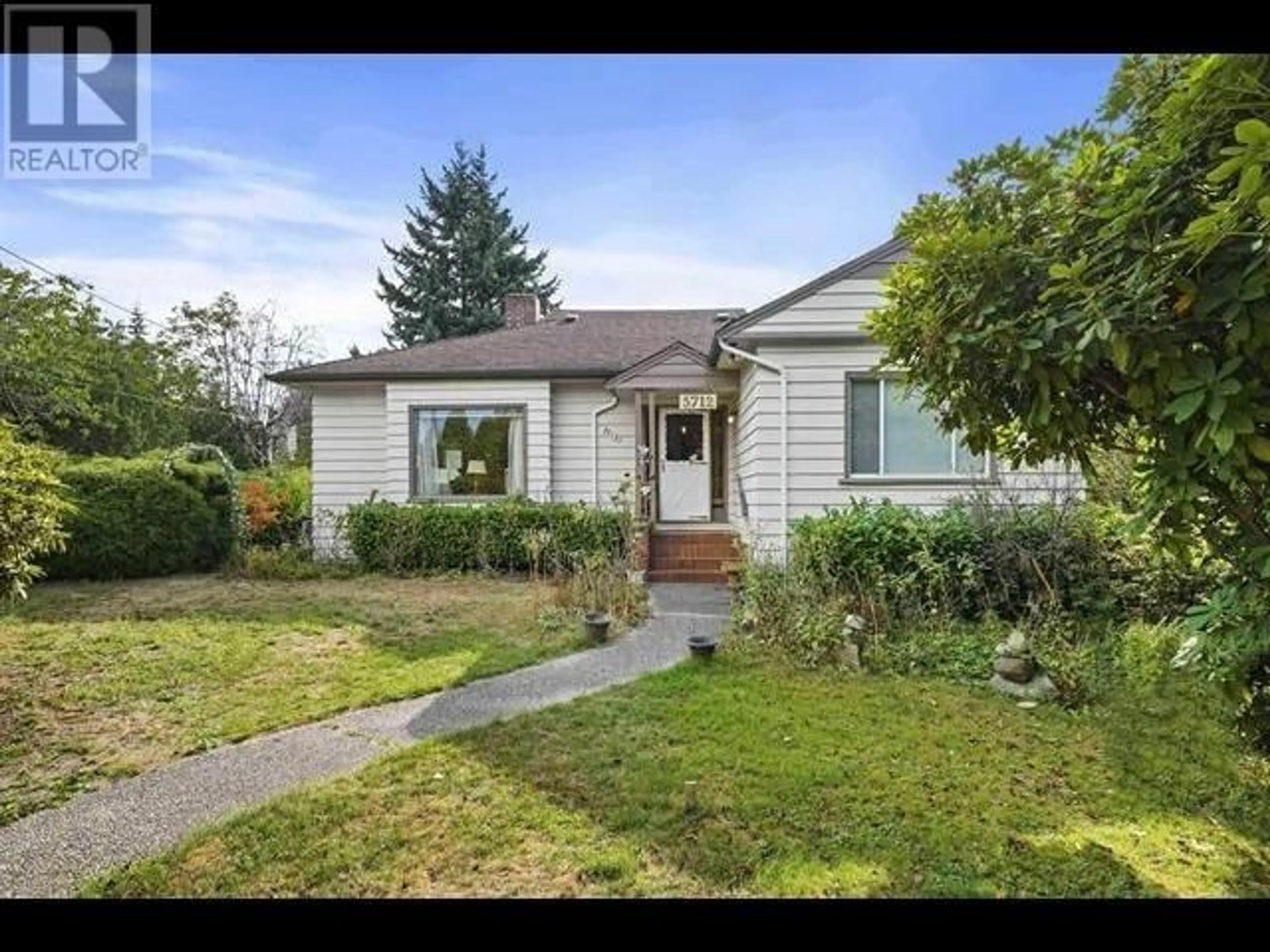 Frontside or backside of a home for 5712 CROWN STREET, Vancouver British Columbia V6N2B7