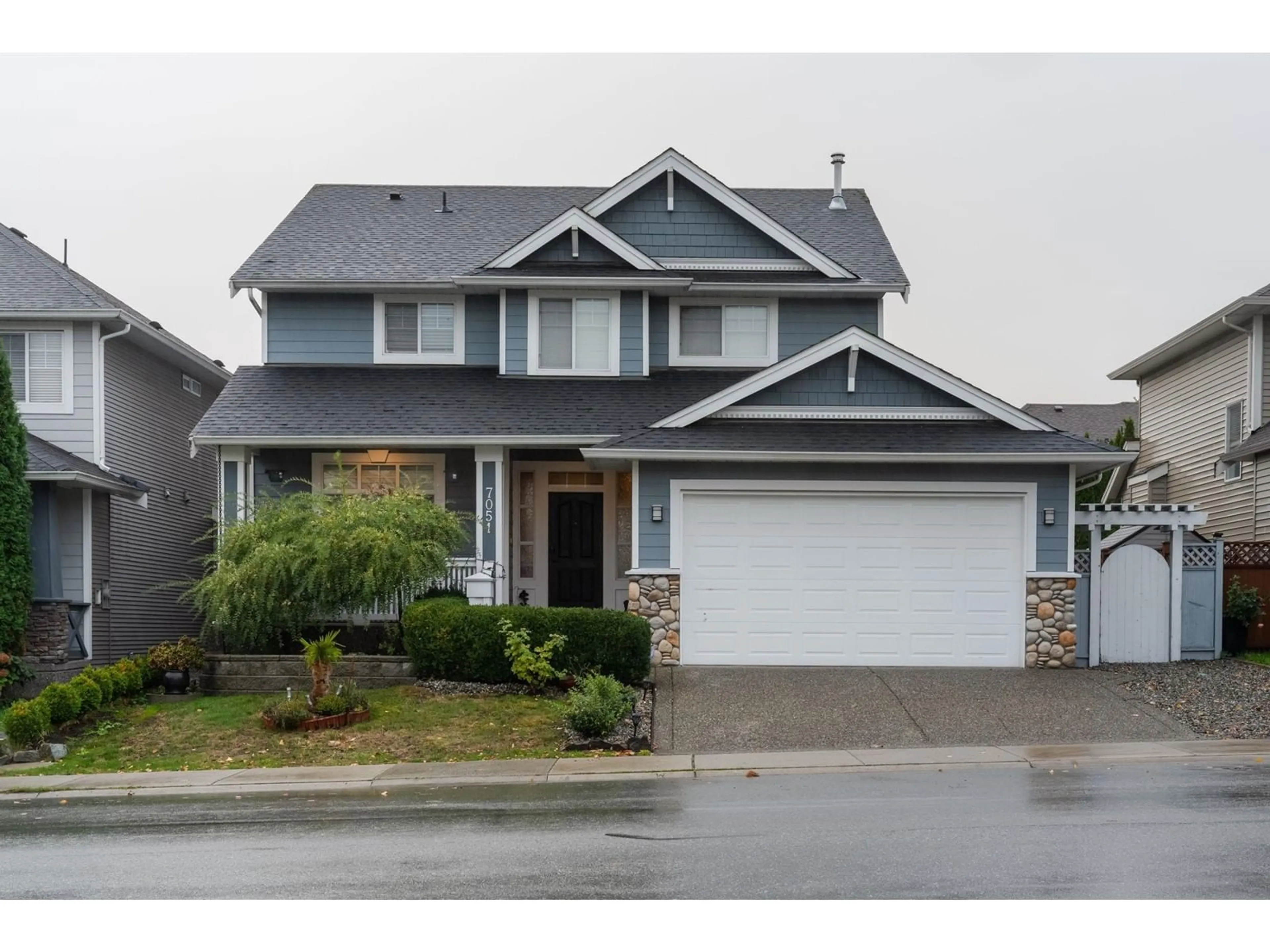 Frontside or backside of a home for 7051 196B STREET, Langley British Columbia V2Y2Z7