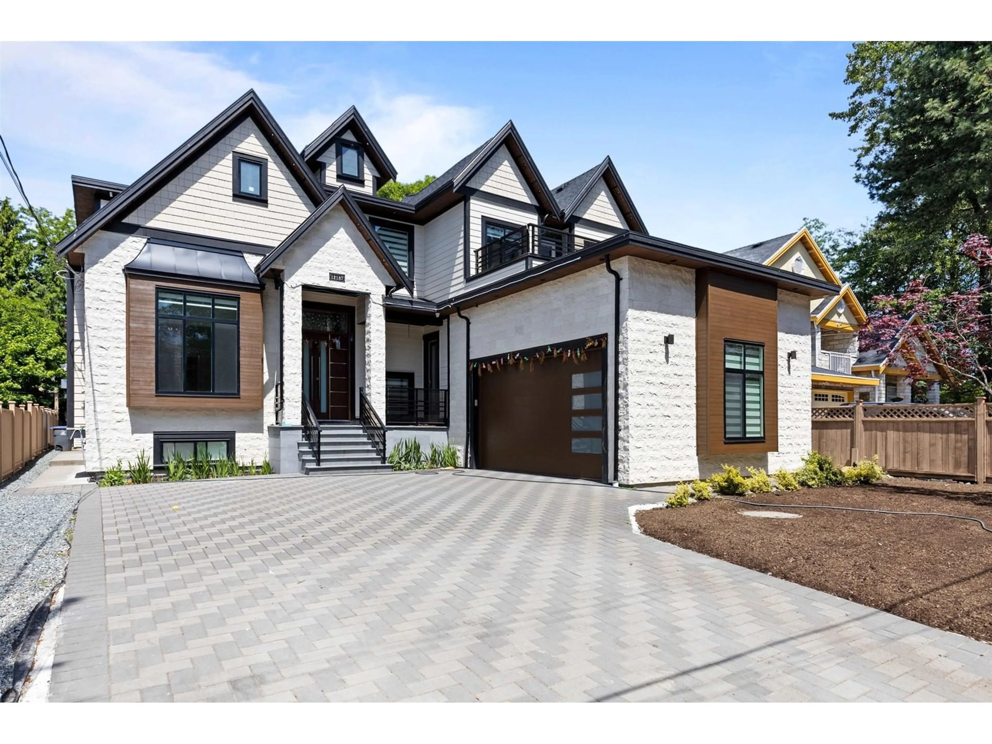 Home with brick exterior material for 12187 71 AVENUE, Surrey British Columbia V3W0T2