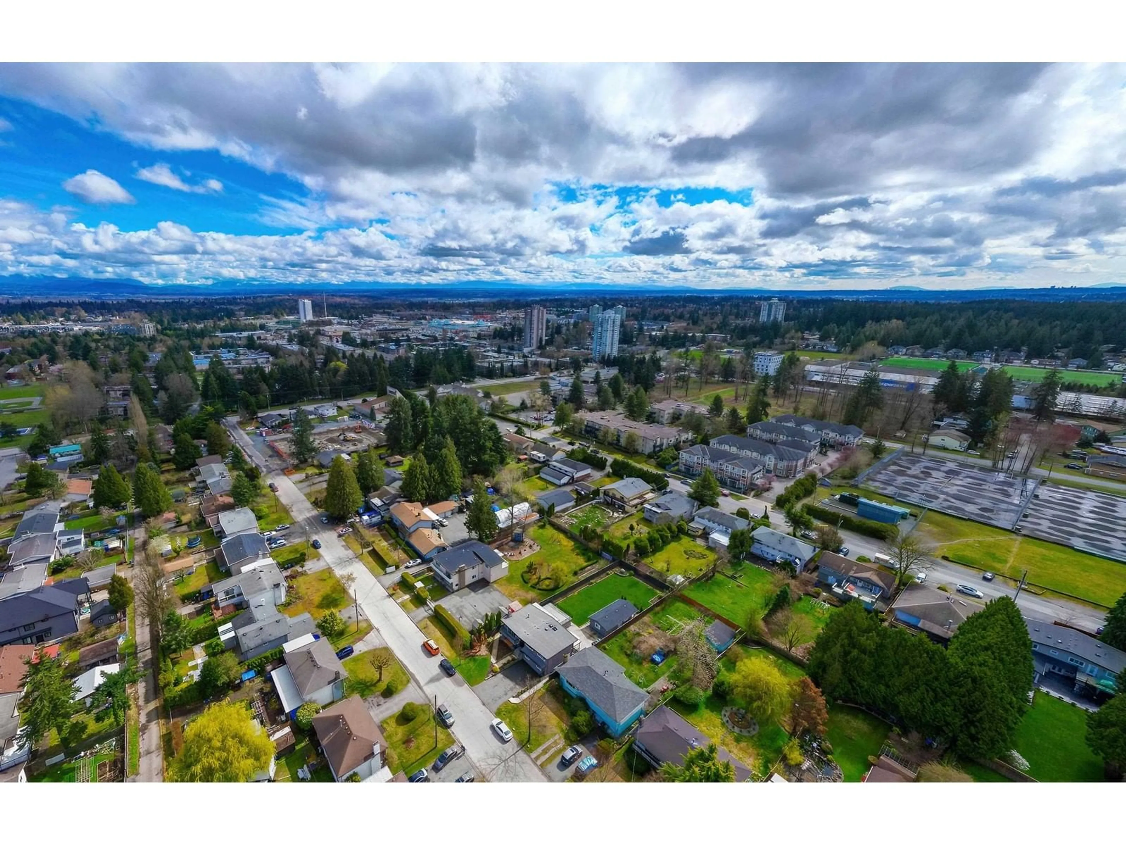 Frontside or backside of a home, the street view for 14611 105A AVENUE, Surrey British Columbia V3R5X8