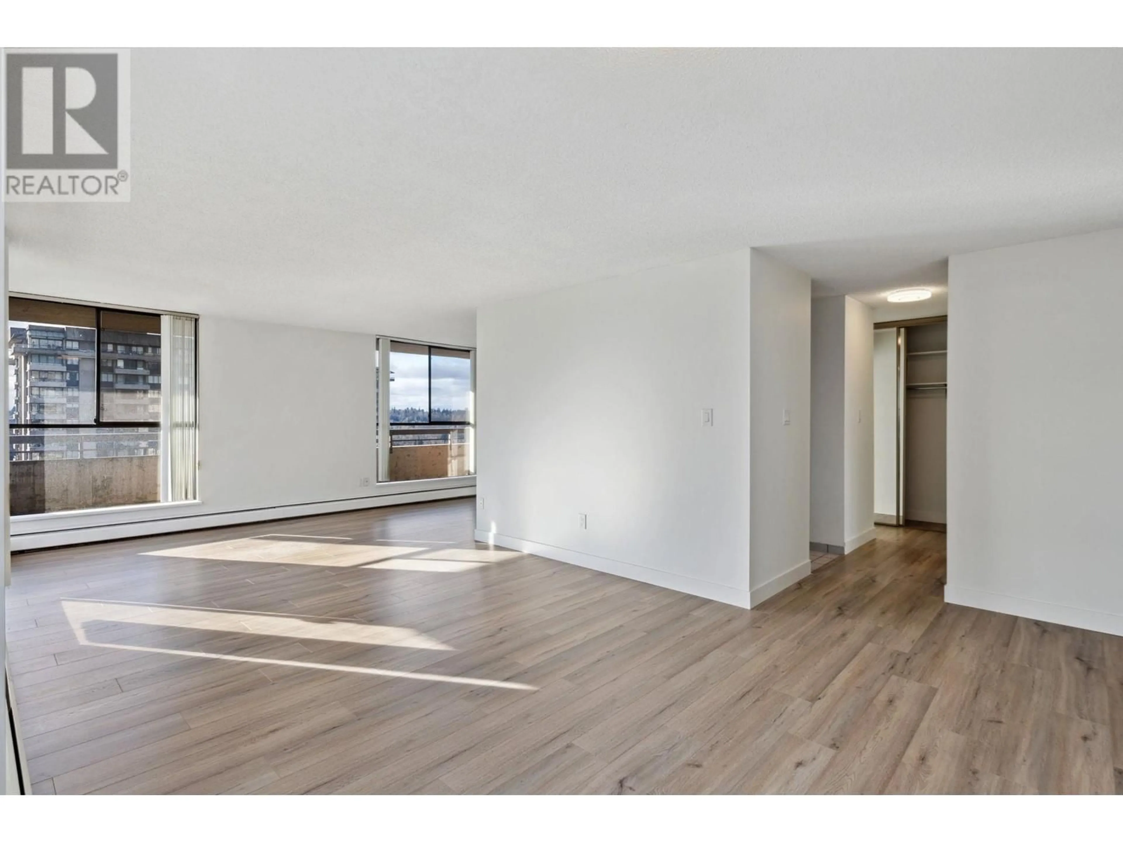 A pic of a room, wood floors for 2103 3737 BARTLETT COURT, Burnaby British Columbia V3J7E3