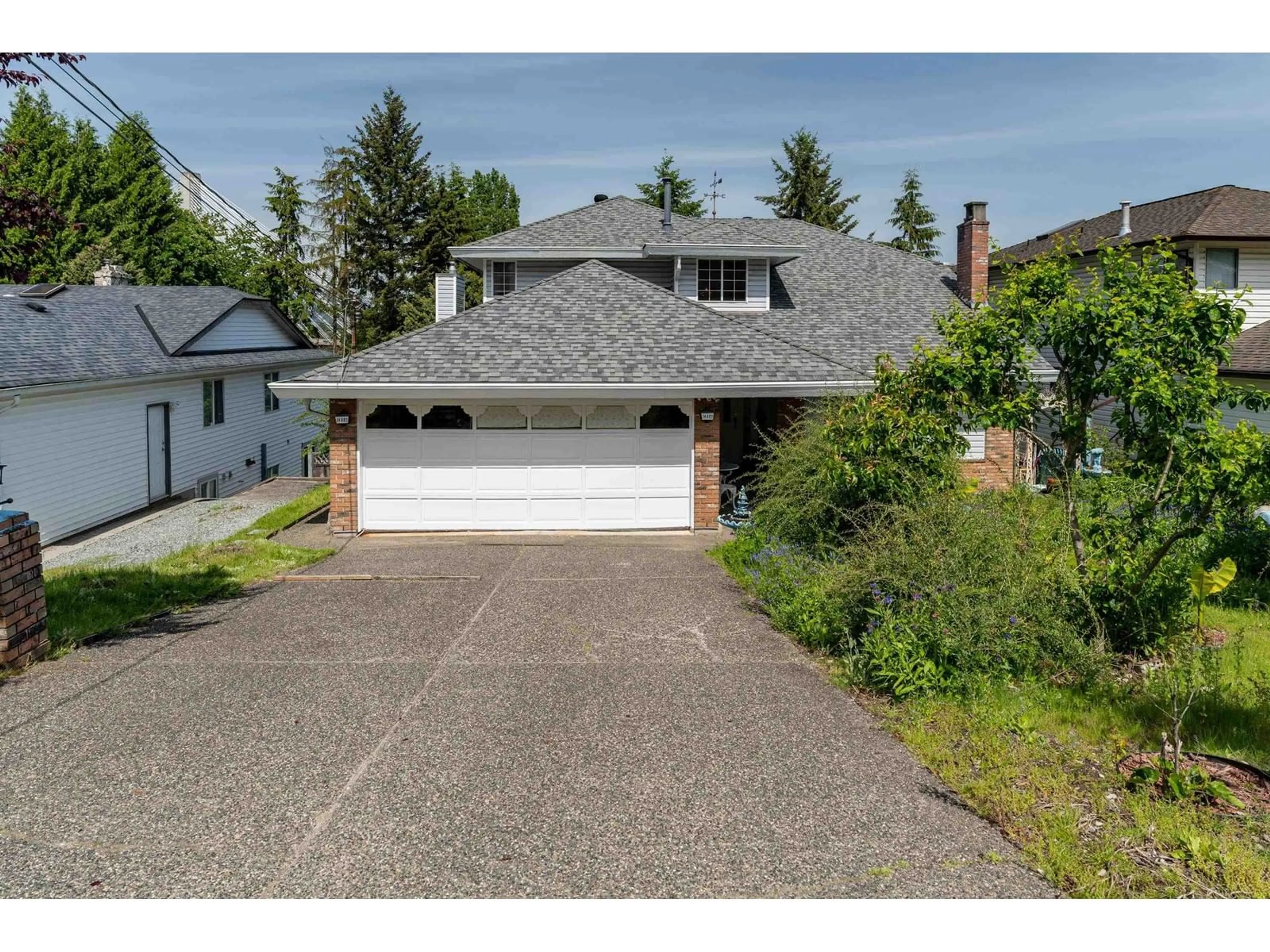 Frontside or backside of a home for 14685 WELLINGTON DRIVE, Surrey British Columbia V3R0A4