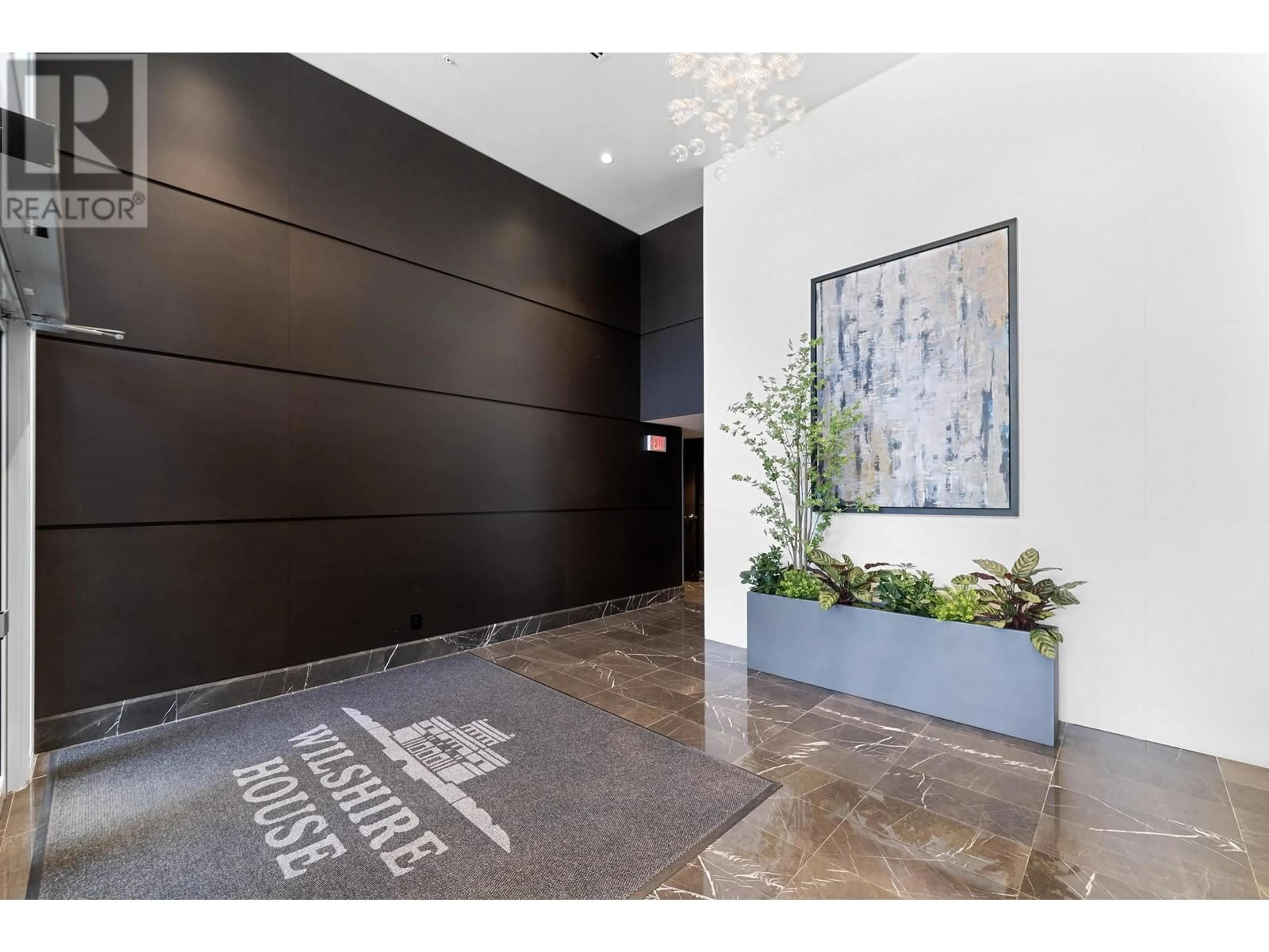 Indoor lobby, wood floors for 310 1571 W 57TH AVENUE, Vancouver British Columbia V6P0H7