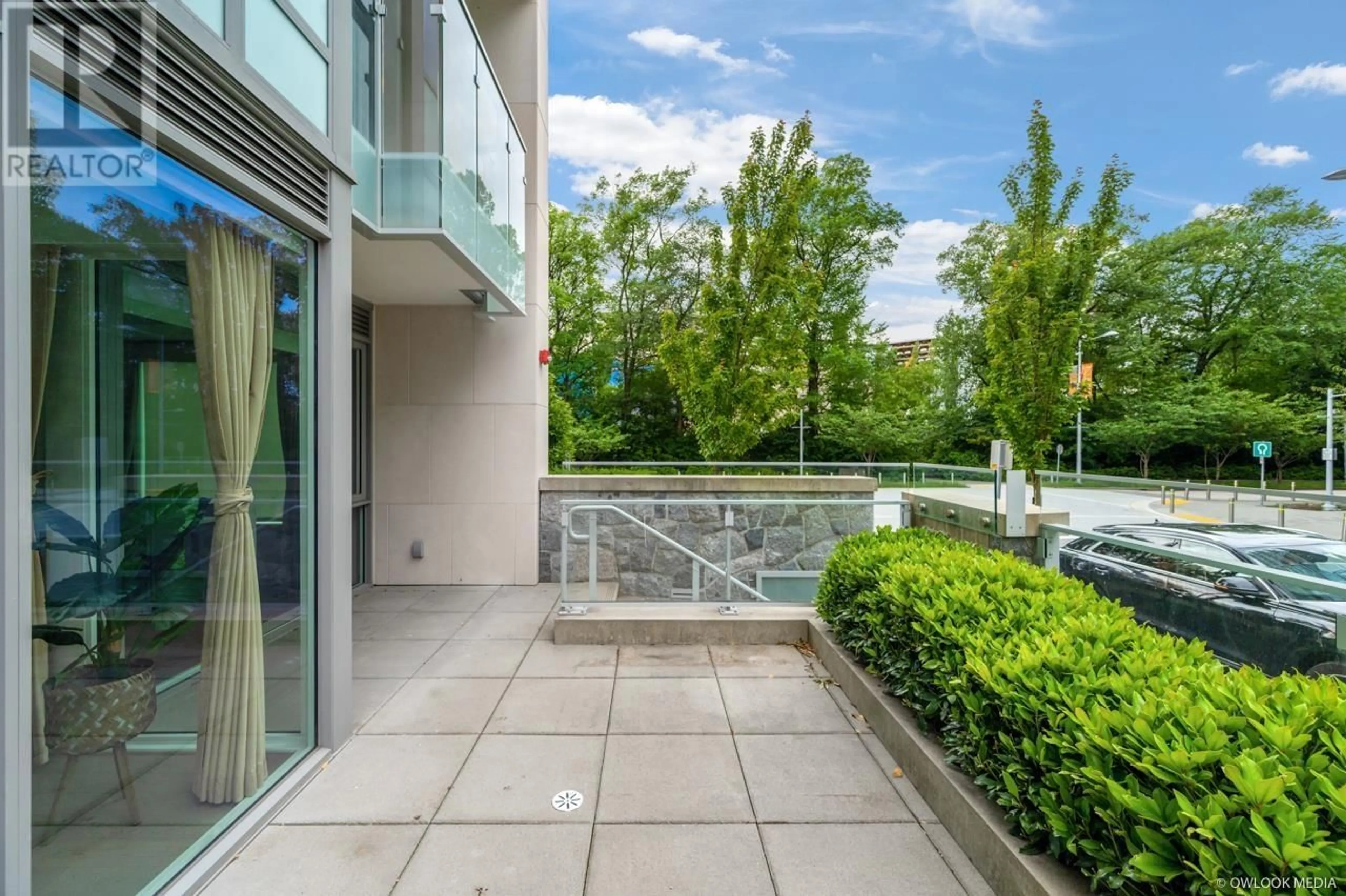 Patio, the front or back of building for 105 6622 PEARSON WAY, Richmond British Columbia V7C0E4