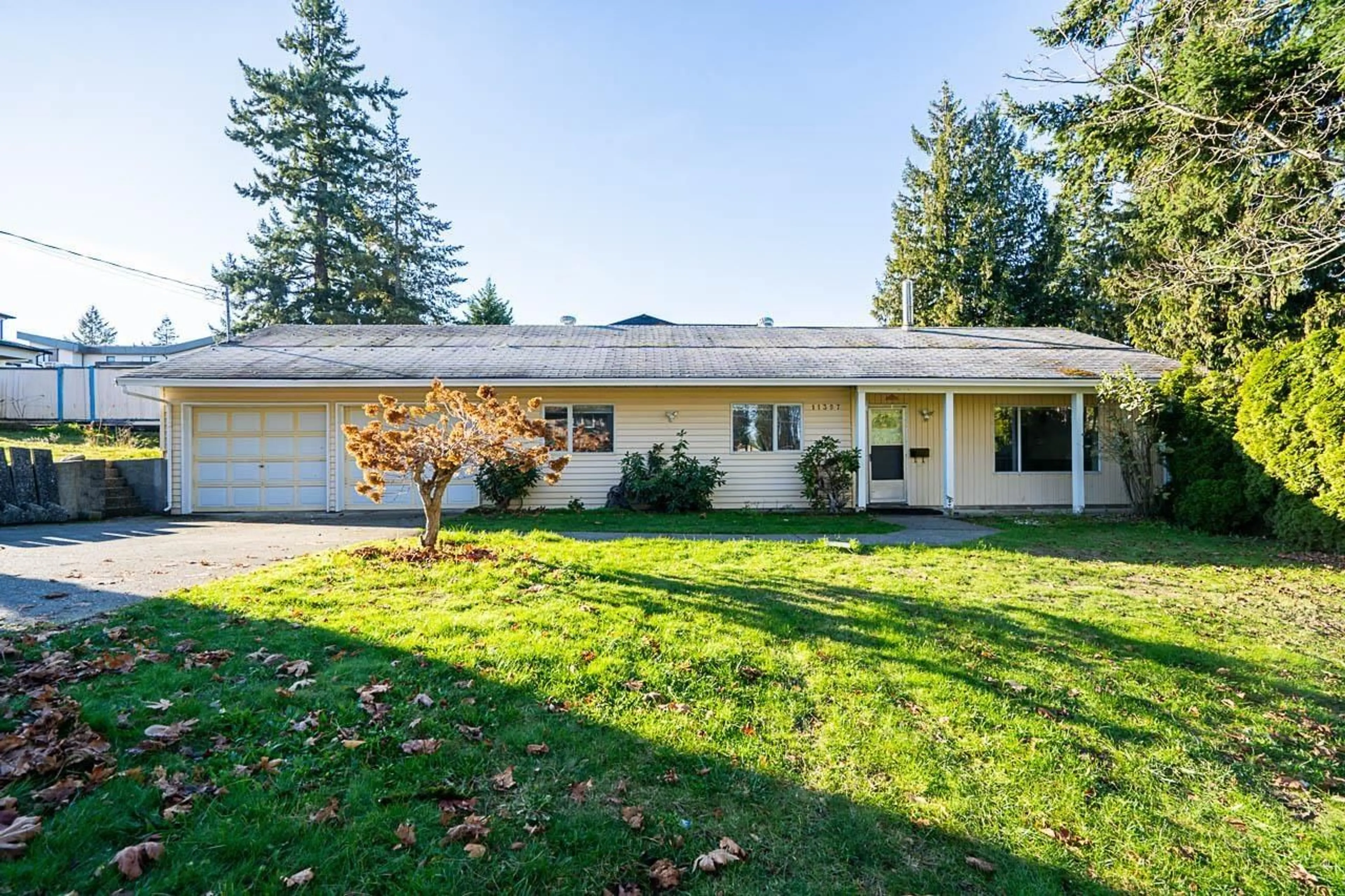 Frontside or backside of a home for 11397 141A STREET, Surrey British Columbia V3R8Z1