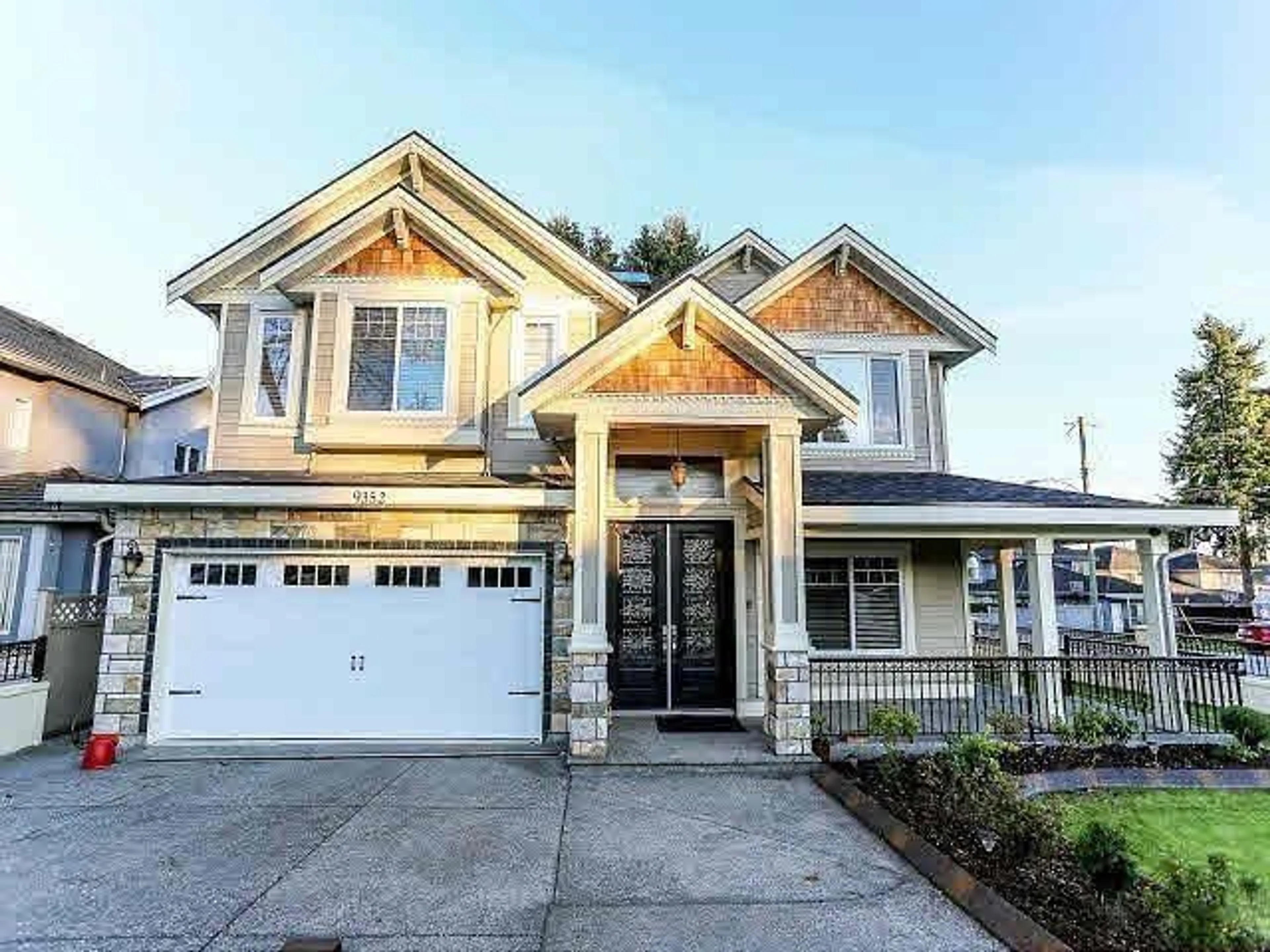 Frontside or backside of a home for 9352 133A STREET, Surrey British Columbia V3V5R7