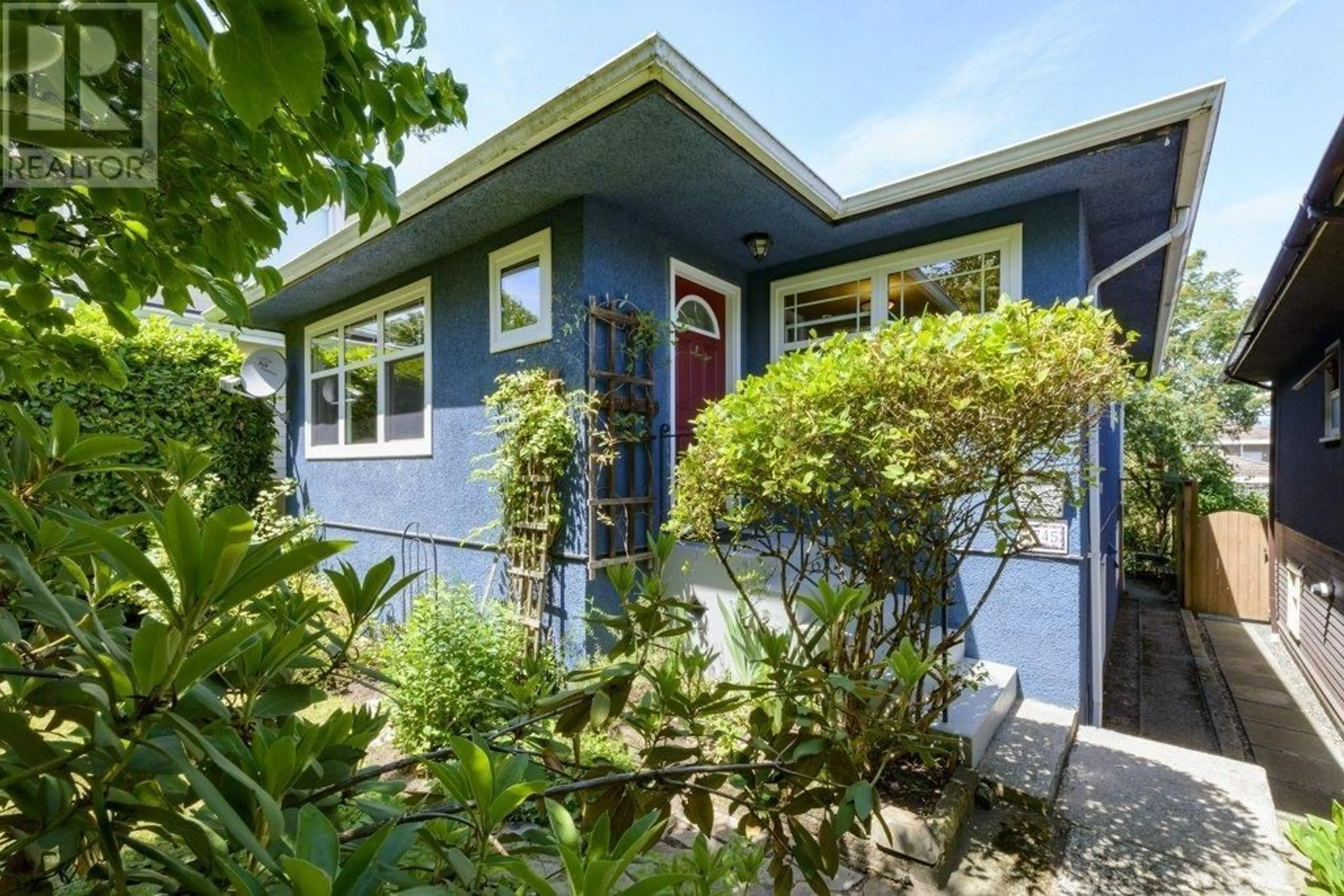 Frontside or backside of a home for 2745 E 5TH AVENUE, Vancouver British Columbia V5M1N3