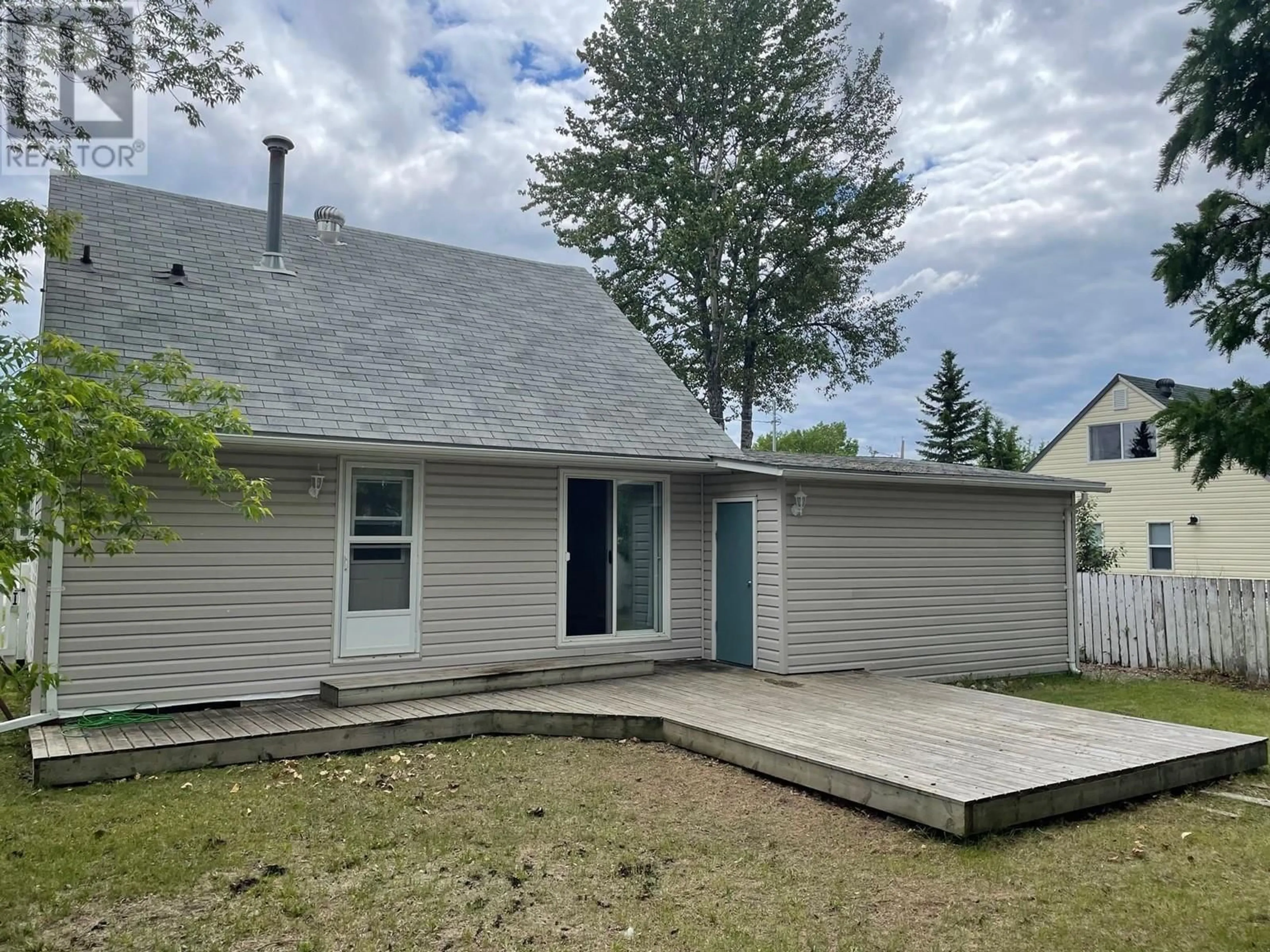 Frontside or backside of a home, cottage for 5319 44 STREET, Fort Nelson British Columbia V0C1R0