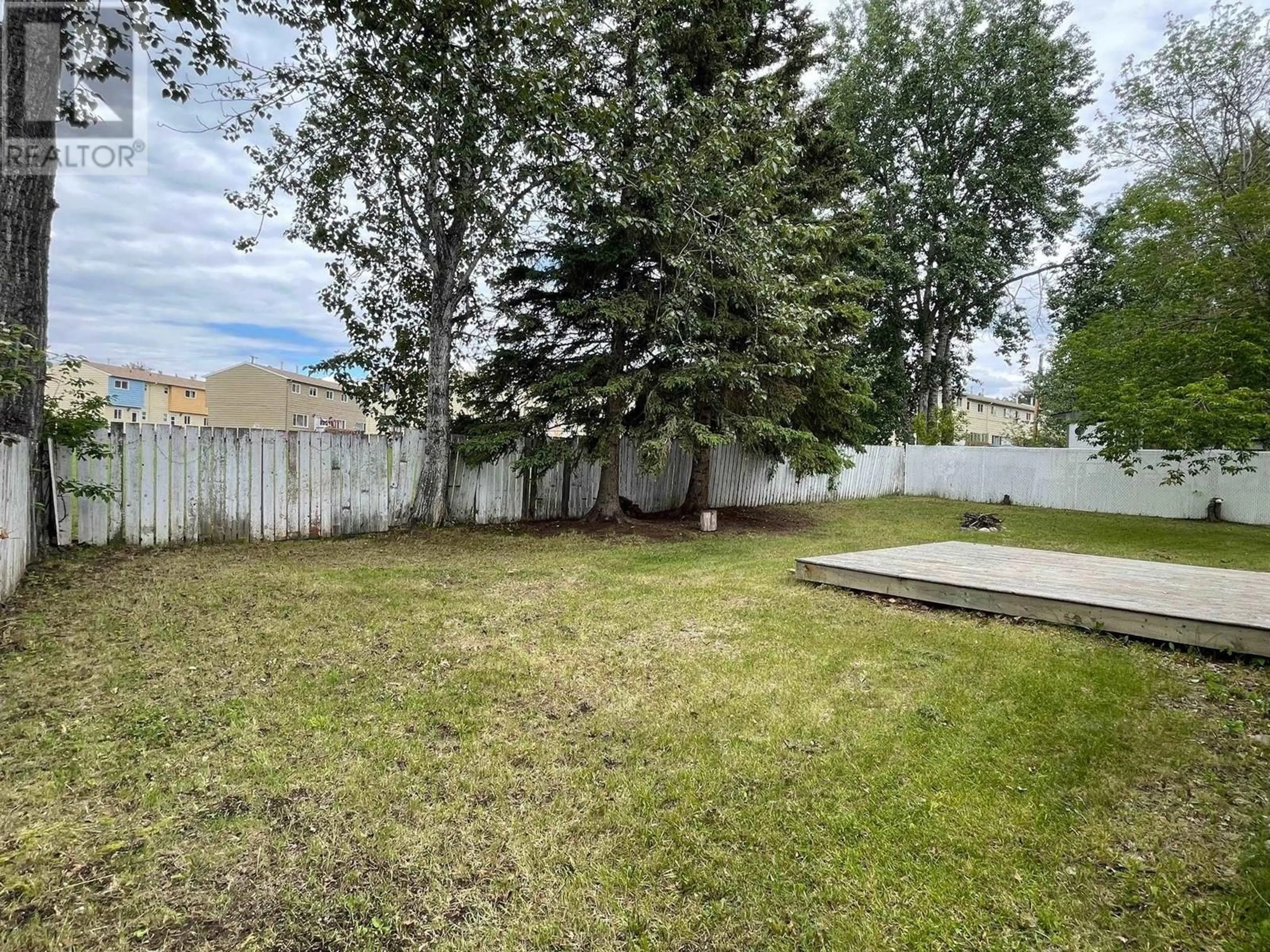 Patio, the fenced backyard for 5319 44 STREET, Fort Nelson British Columbia V0C1R0