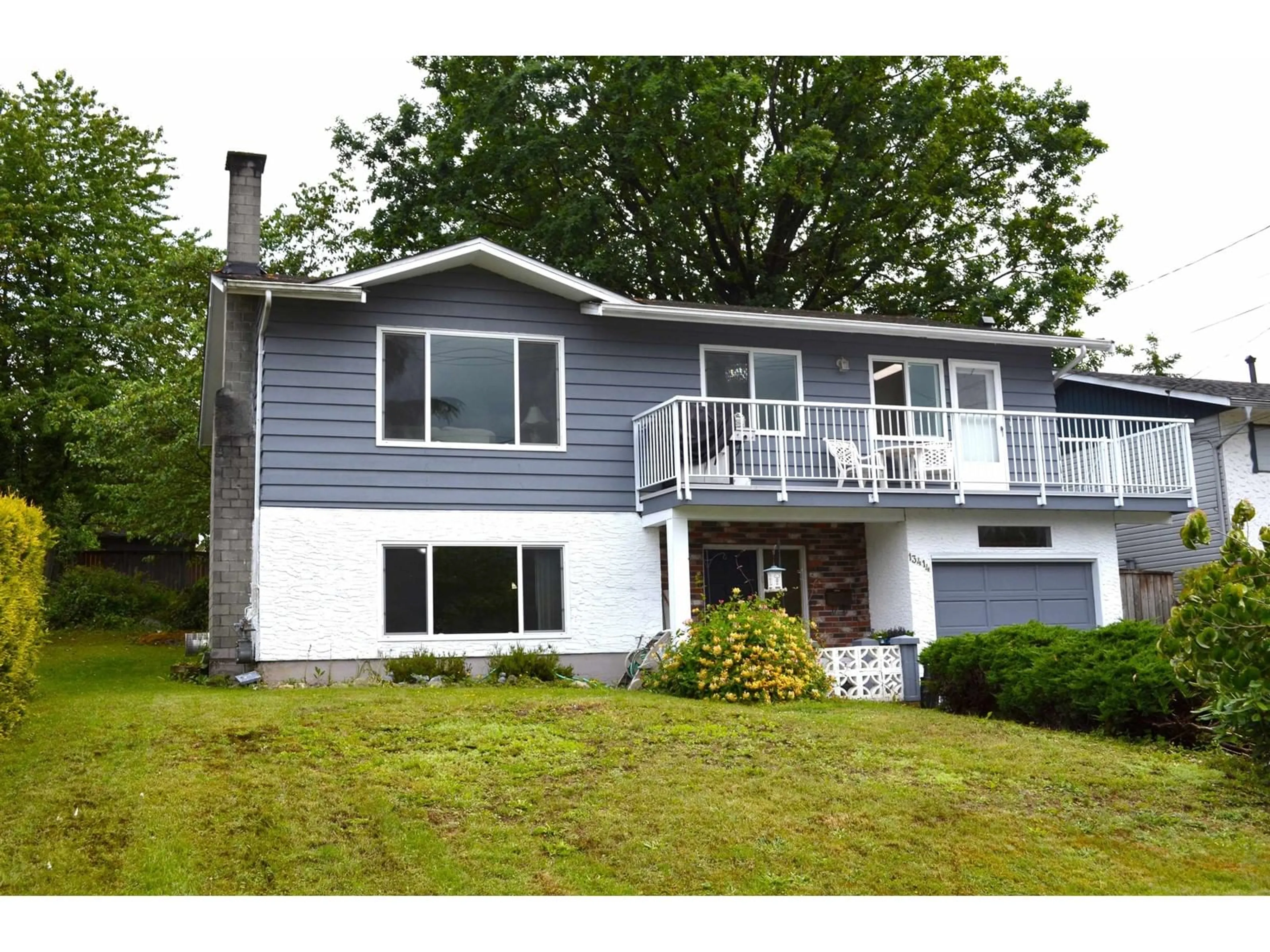 Frontside or backside of a home for 13414 113 AVENUE, Surrey British Columbia V3R2H6
