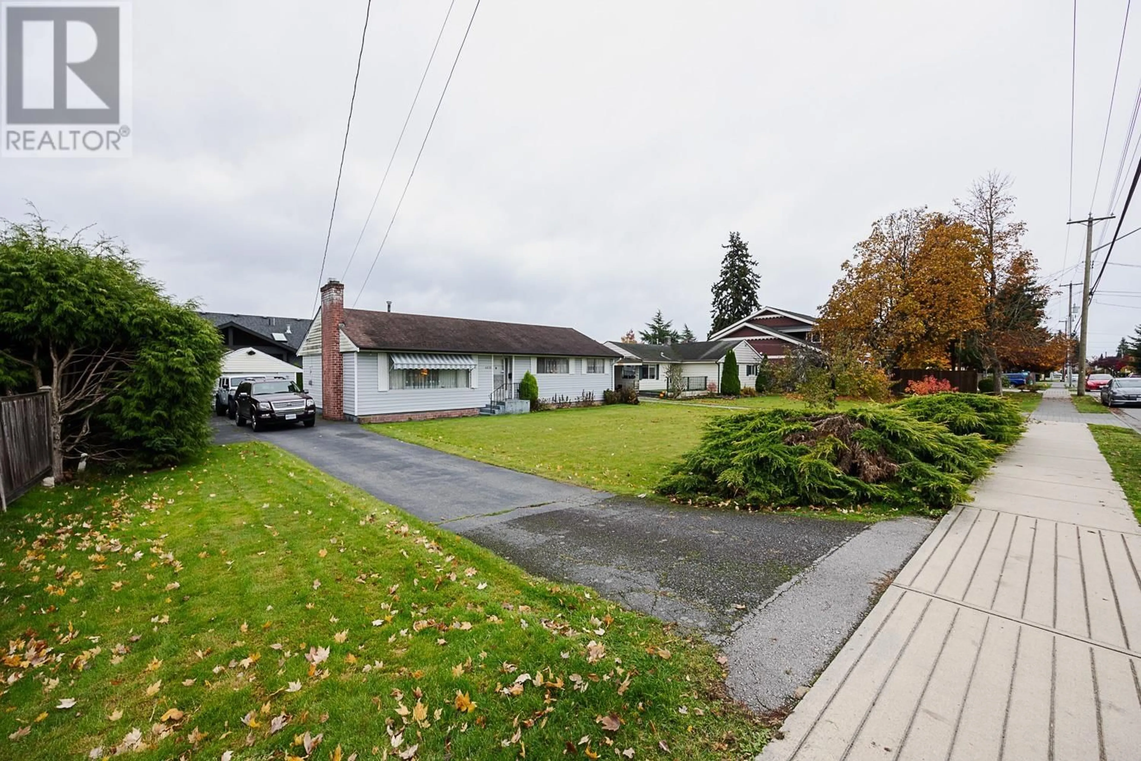 A pic from outside/outdoor area/front of a property/back of a property/a pic from drone, street for 4638 53 STREET, Delta British Columbia V4K2Z1