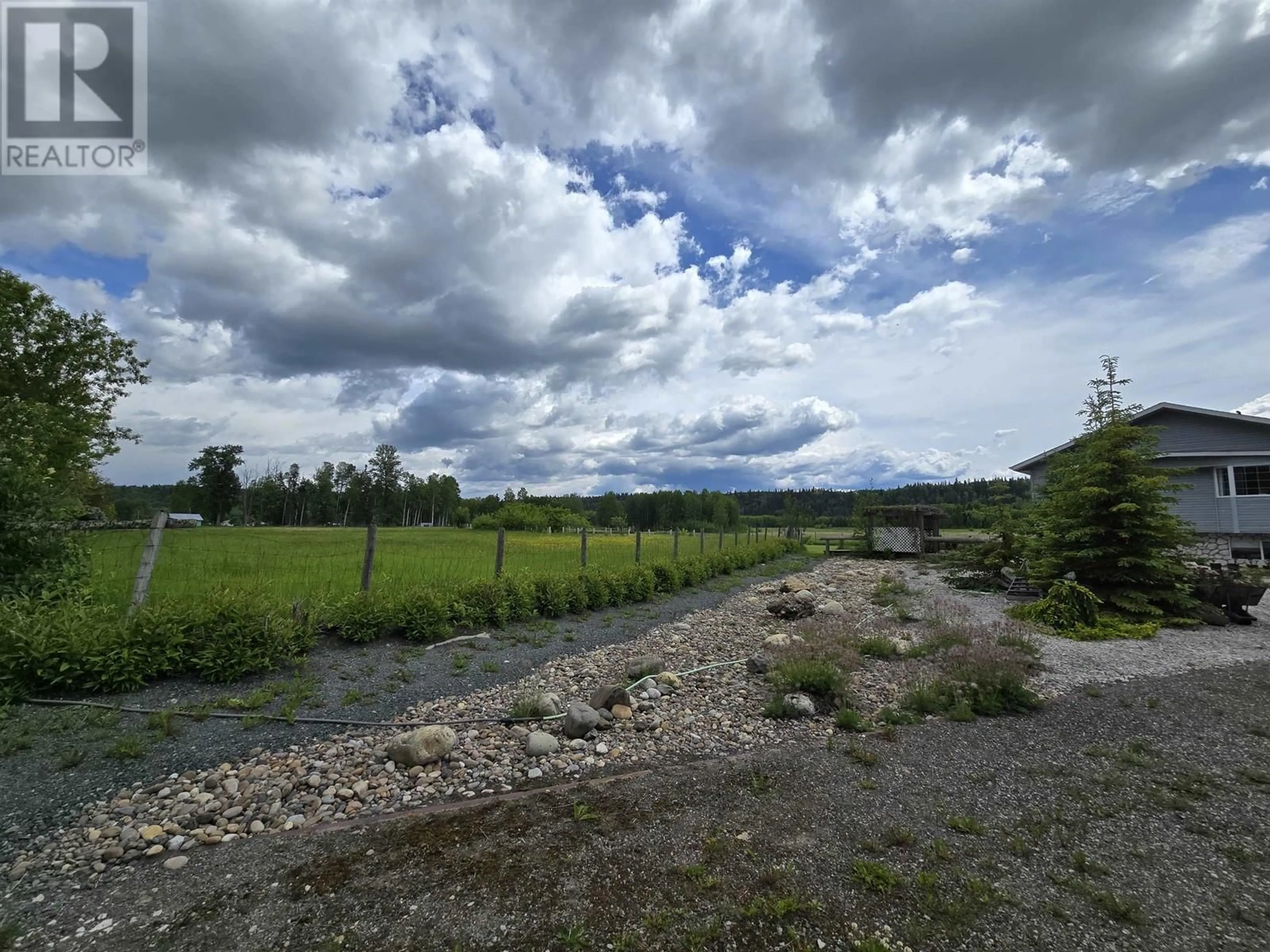 A pic from outside/outdoor area/front of a property/back of a property/a pic from drone, mountain view for 6175 BEAVER FOREST ROAD, Prince George British Columbia V2K5E5
