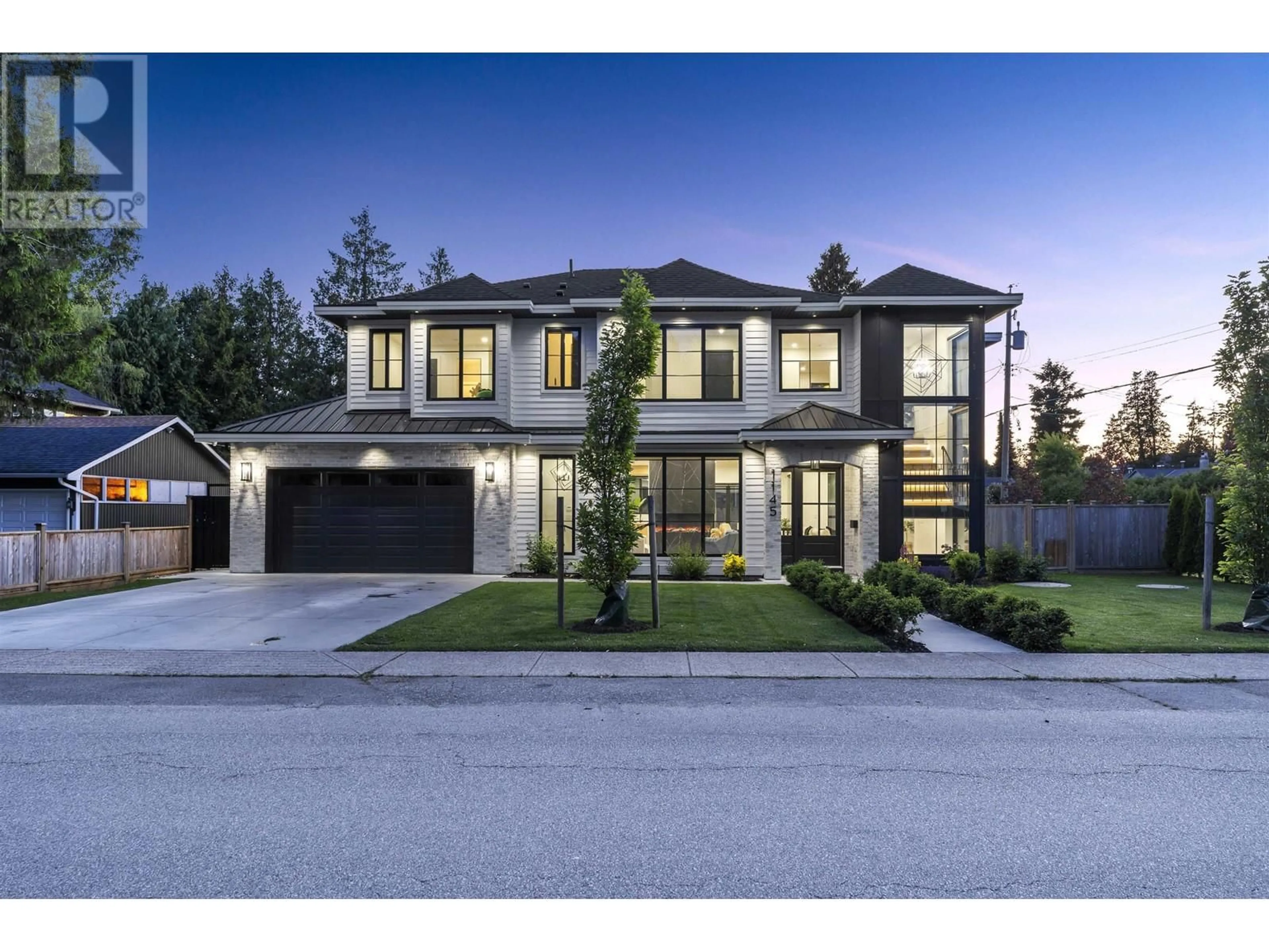 Frontside or backside of a home for 1145 50B STREET, Delta British Columbia V4M2W2