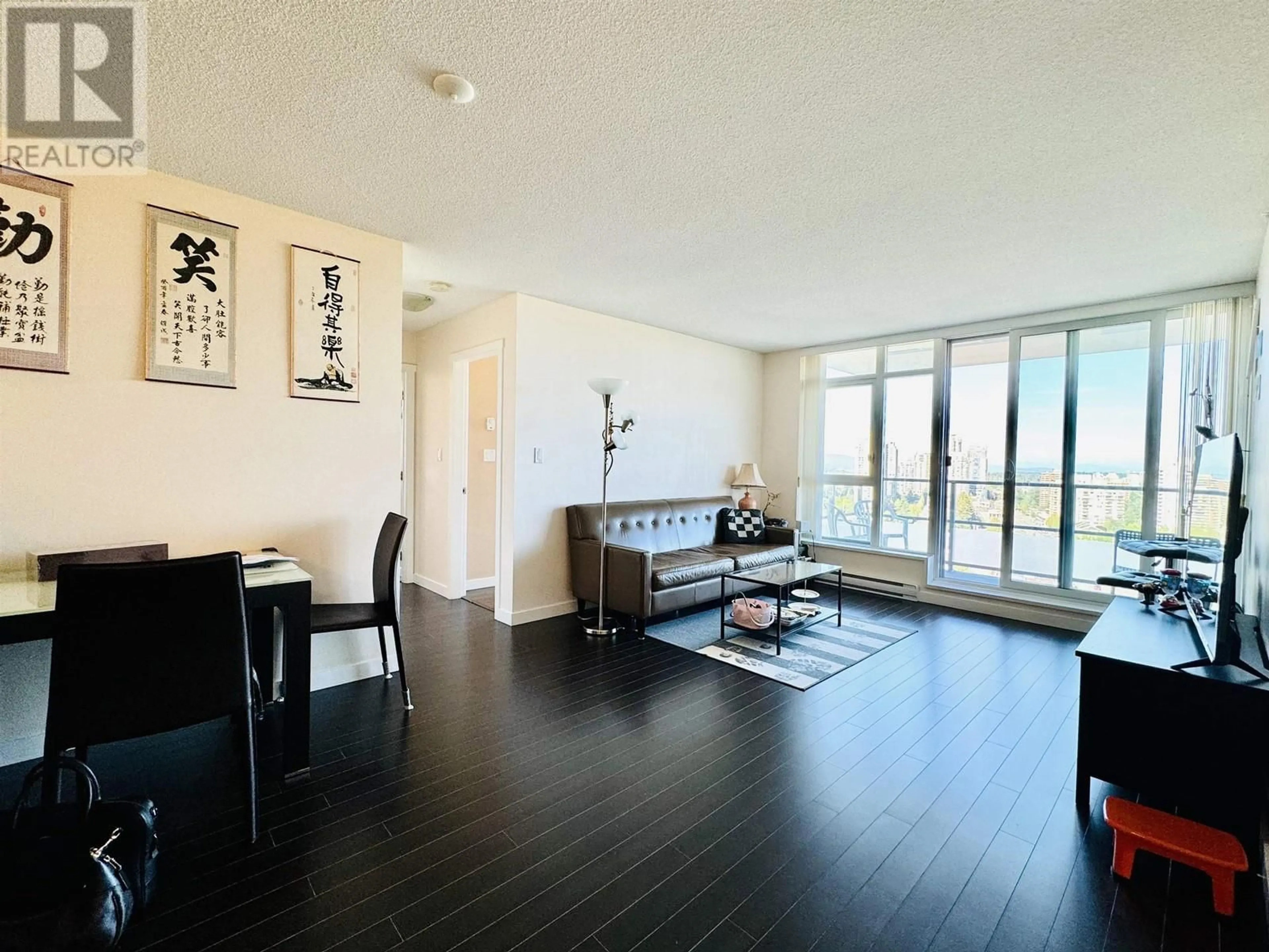 A pic of a room, wood floors for 2003 6688 ARCOLA STREET, Burnaby British Columbia V5E0B3