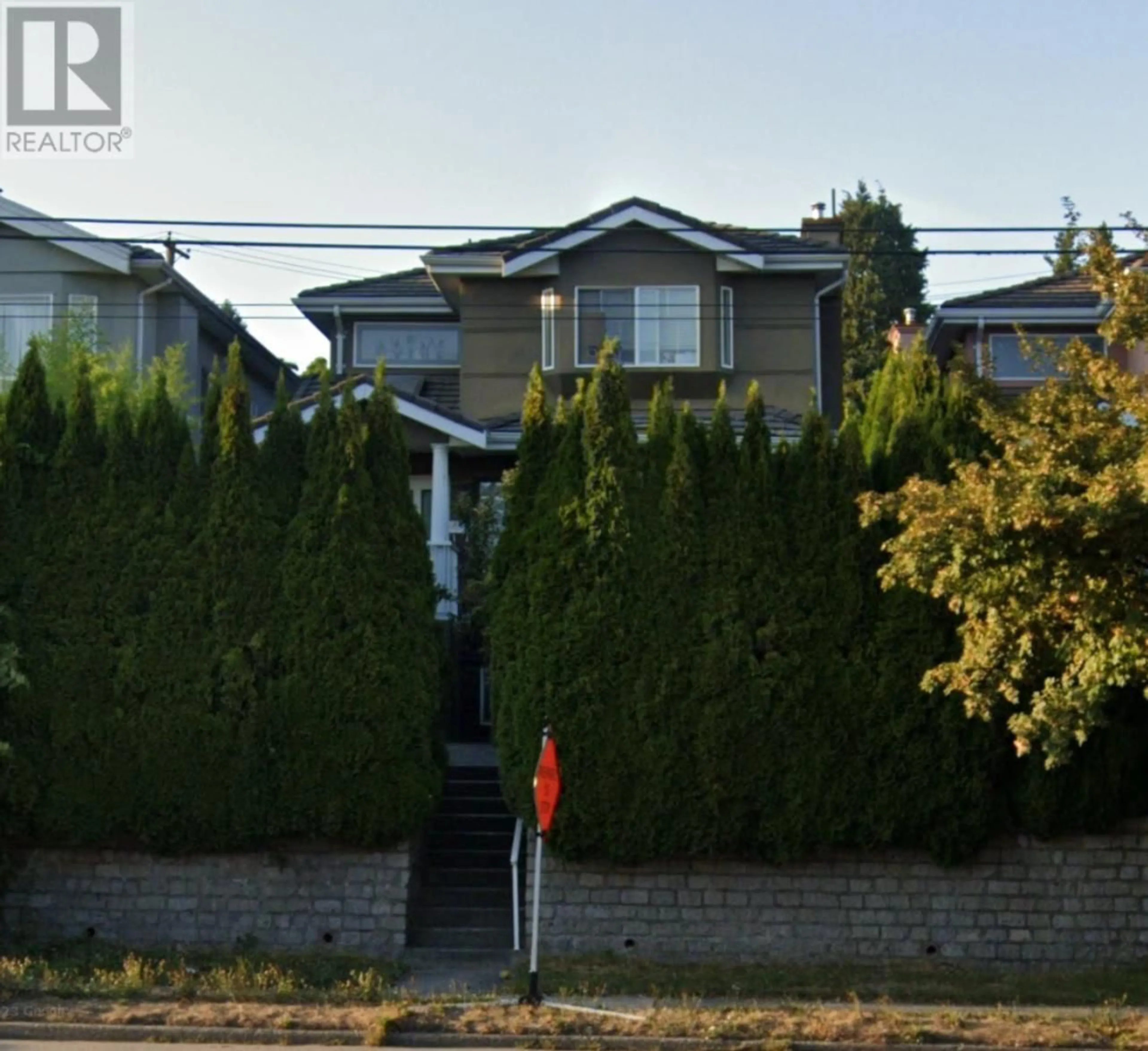 A pic from outside/outdoor area/front of a property/back of a property/a pic from drone, street for 2945 BROADWAY, Vancouver British Columbia V5M1Z2