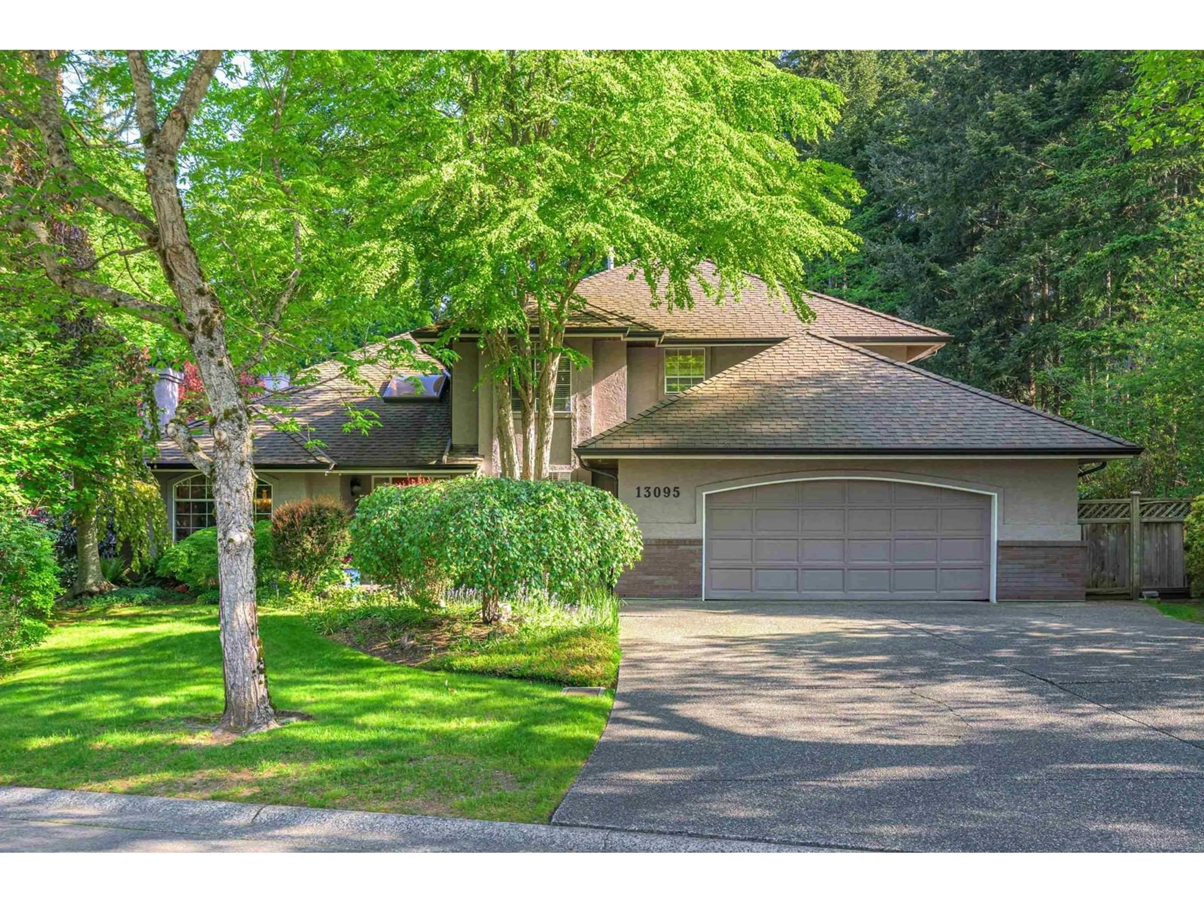 Frontside or backside of a home for 13095 21A AVENUE, Surrey British Columbia V4A8M3