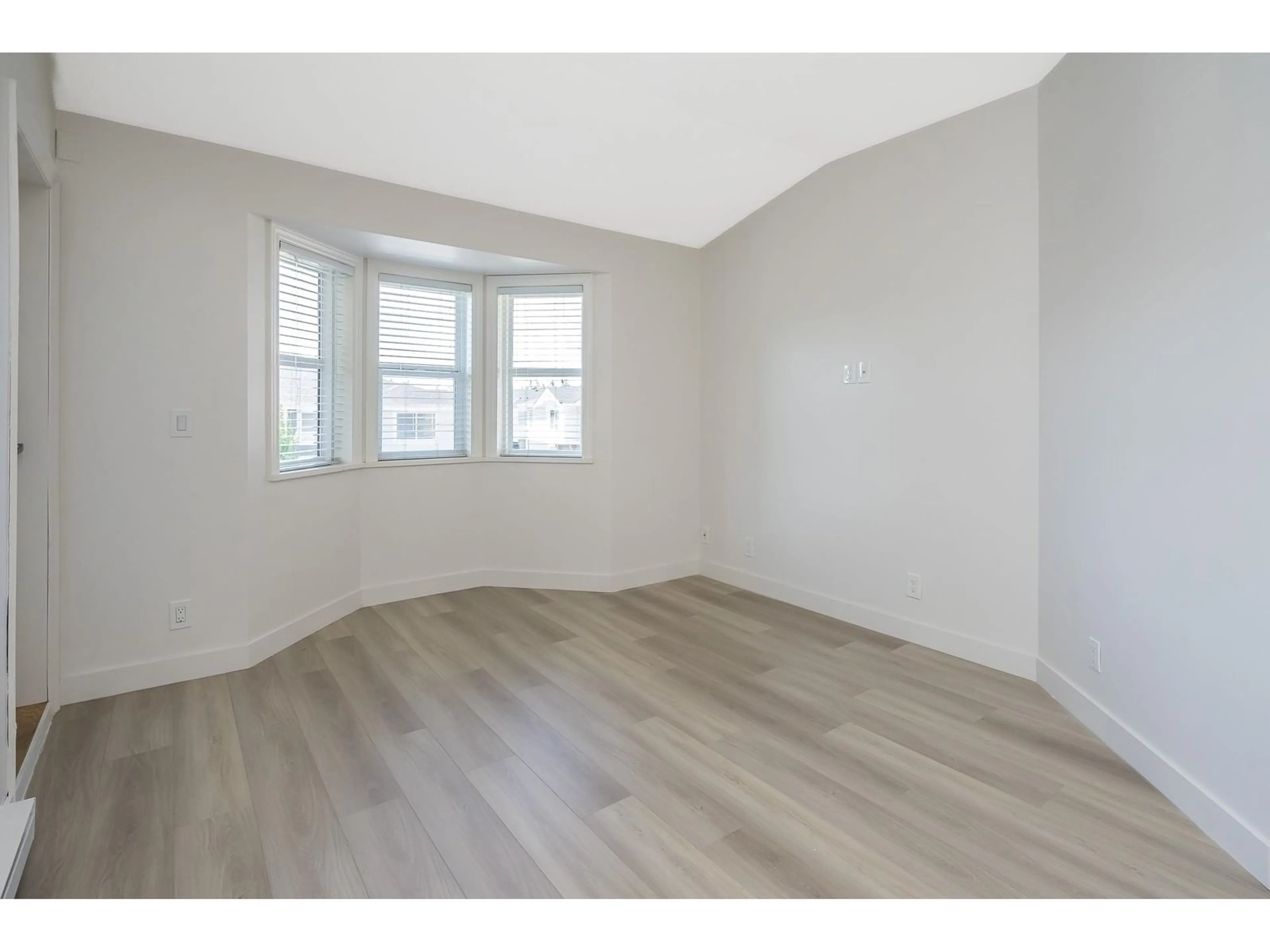 A pic of a room, wood floors for 306 19774 56TH AVENUE, Langley British Columbia V3A3X6