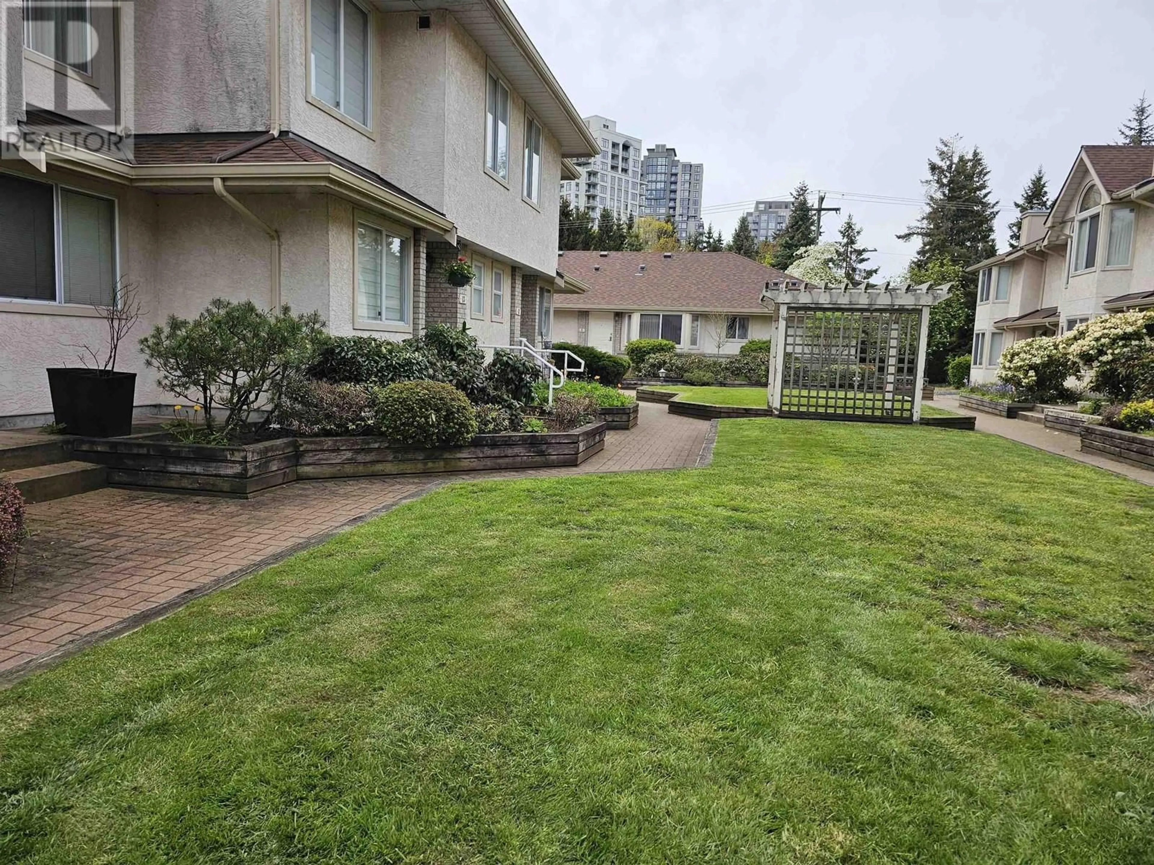 Frontside or backside of a home, the fenced backyard for 12 3701 THURSTON STREET, Burnaby British Columbia V5H1H6