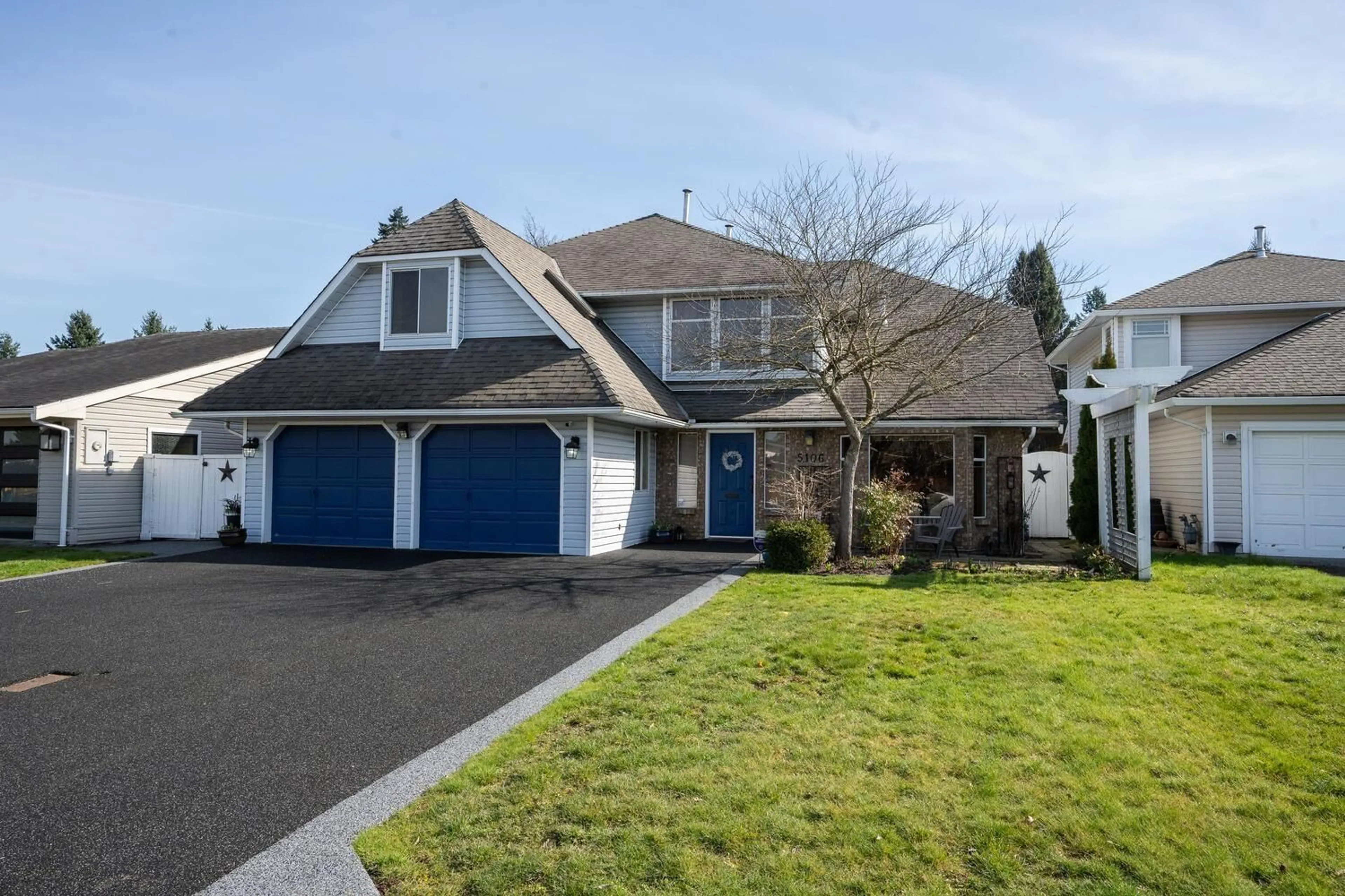 Frontside or backside of a home for 5106 209A STREET, Langley British Columbia V3A7K8