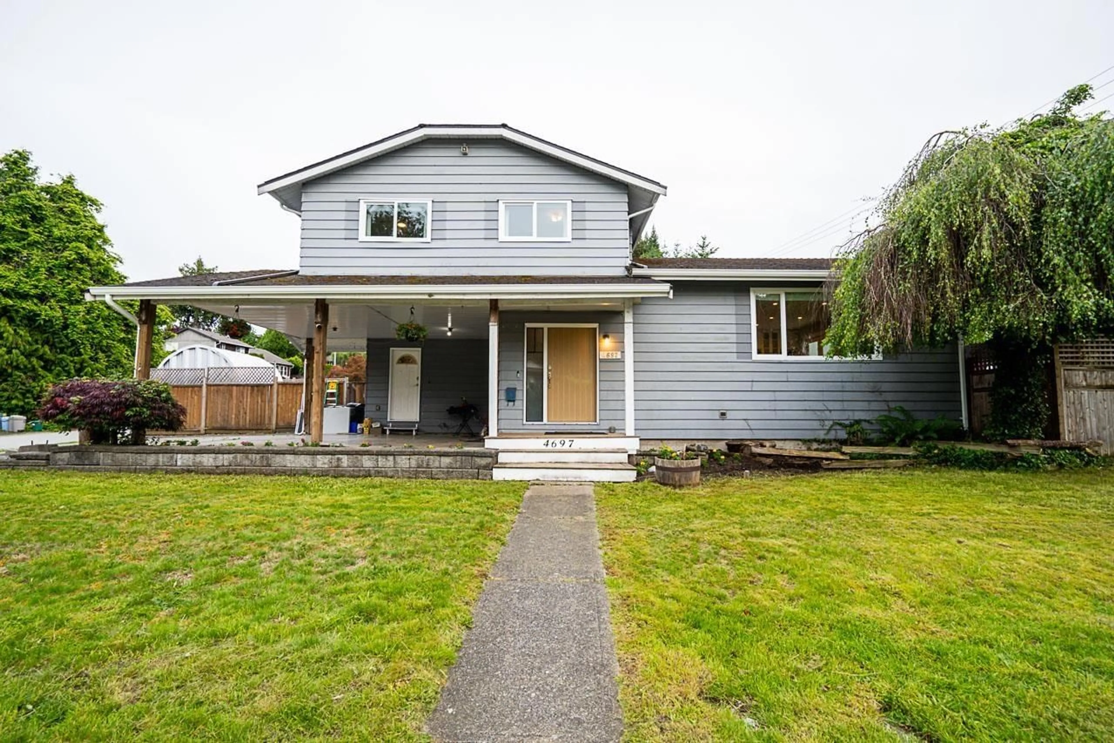 Frontside or backside of a home for 4697 208A STREET, Langley British Columbia V3A7E5