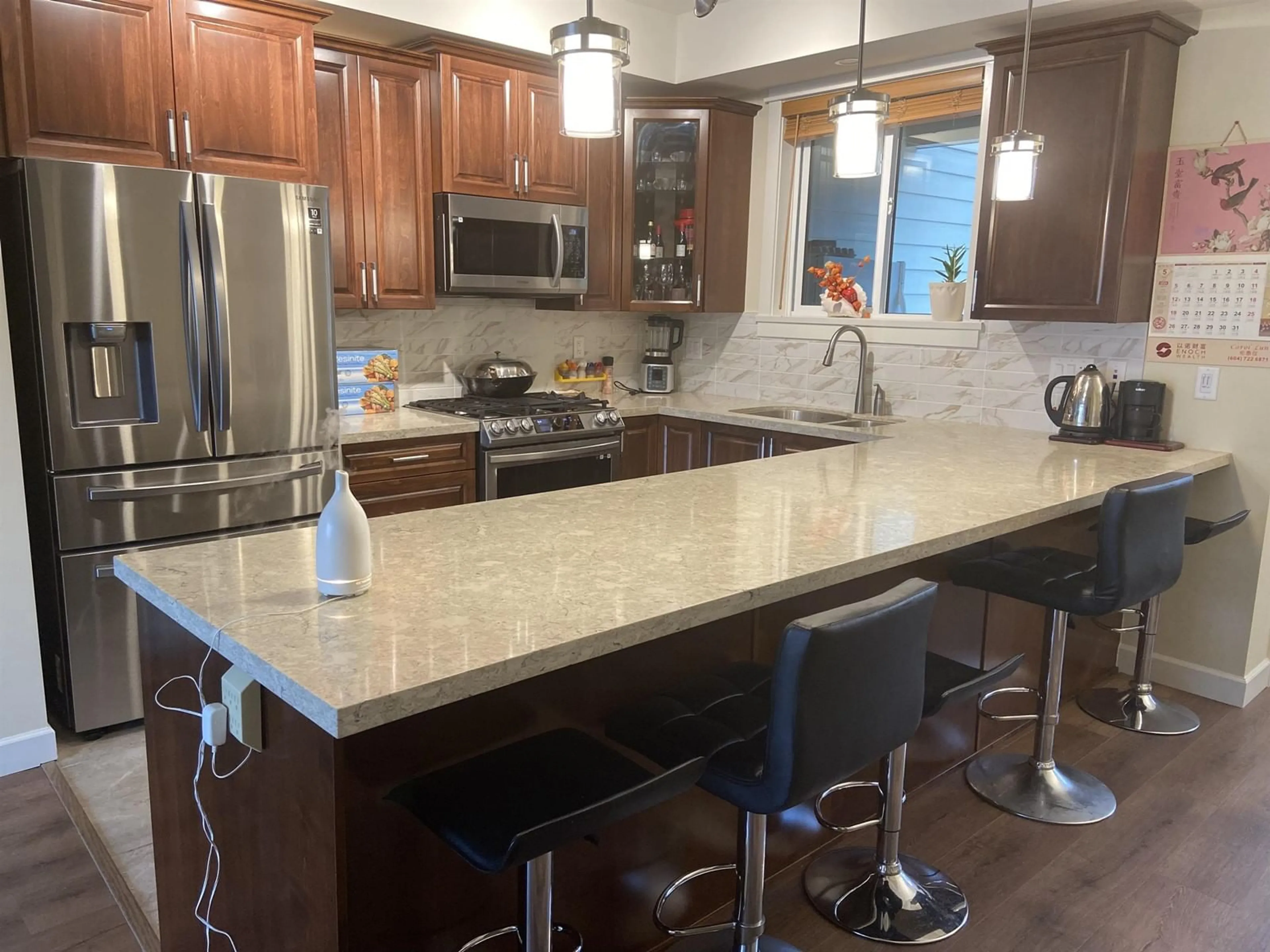 Open concept kitchen, ceramic/tile floor for 9 - 8567 204, Langley British Columbia V2Y3R2