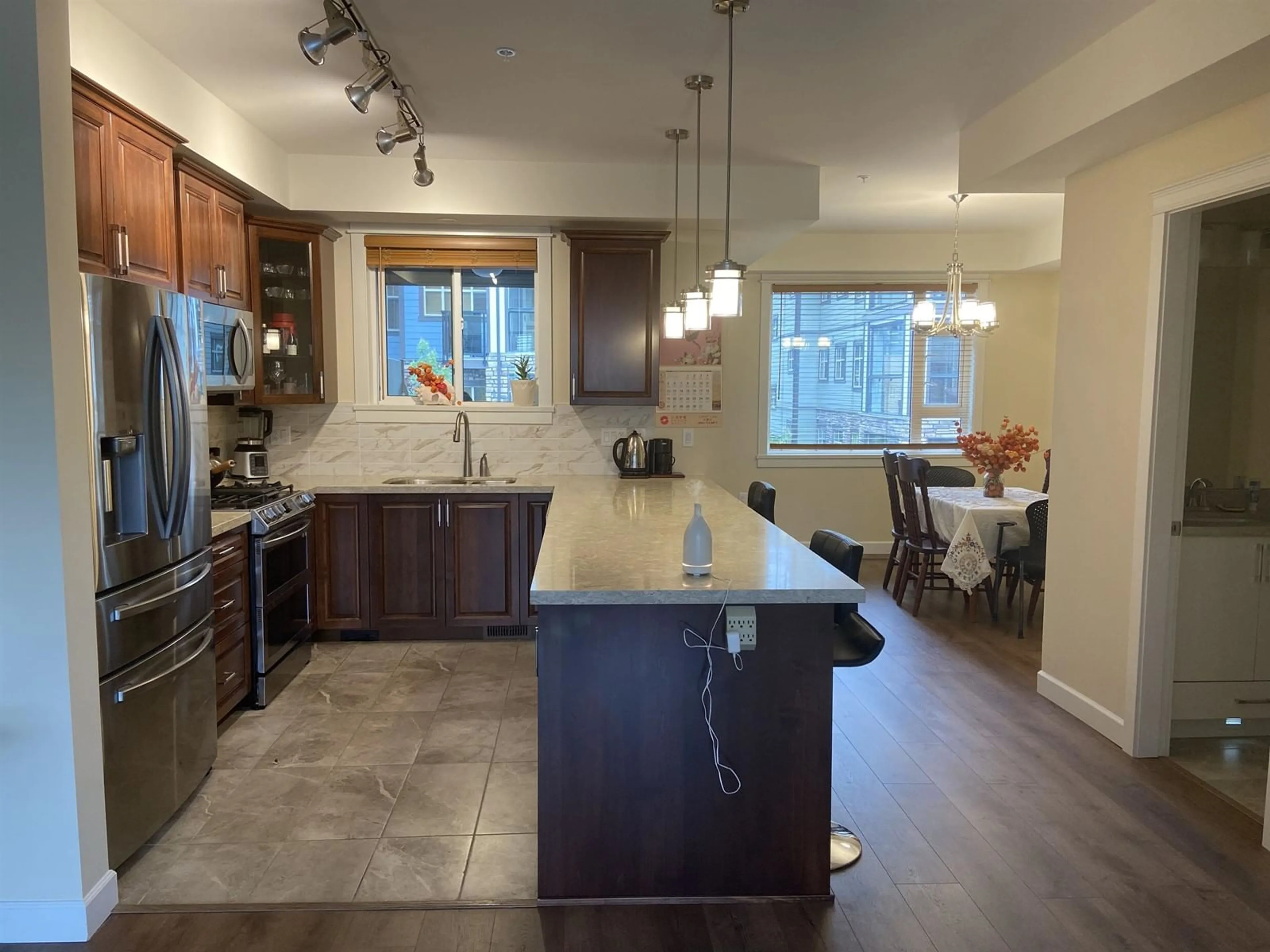 Open concept kitchen, ceramic/tile floor for 9 - 8567 204, Langley British Columbia V2Y3R2