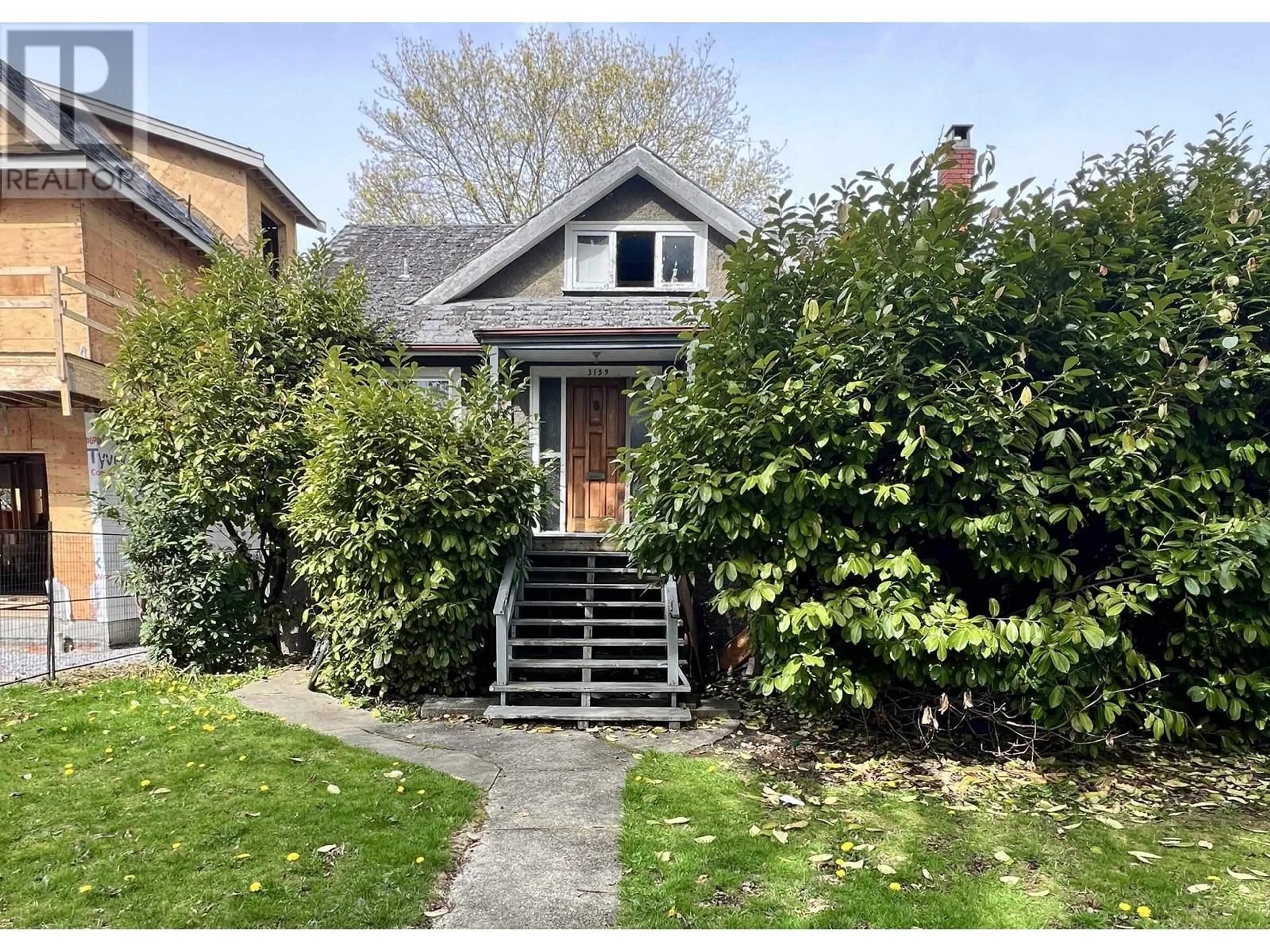 Frontside or backside of a home for 3159 W 14TH AVENUE, Vancouver British Columbia V6K2X9