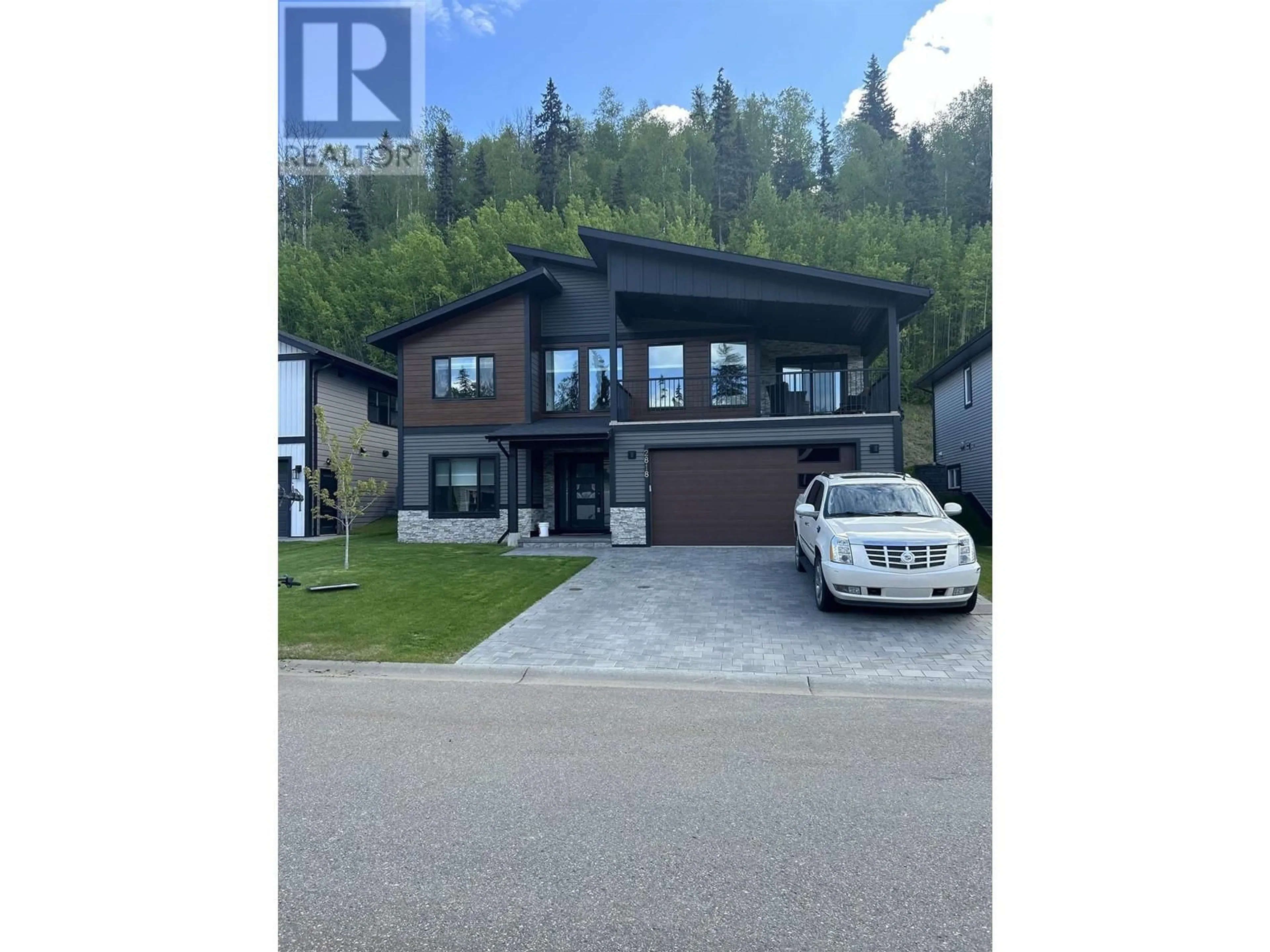 Frontside or backside of a home for 2818 LINKS DRIVE, Prince George British Columbia V2K0B3