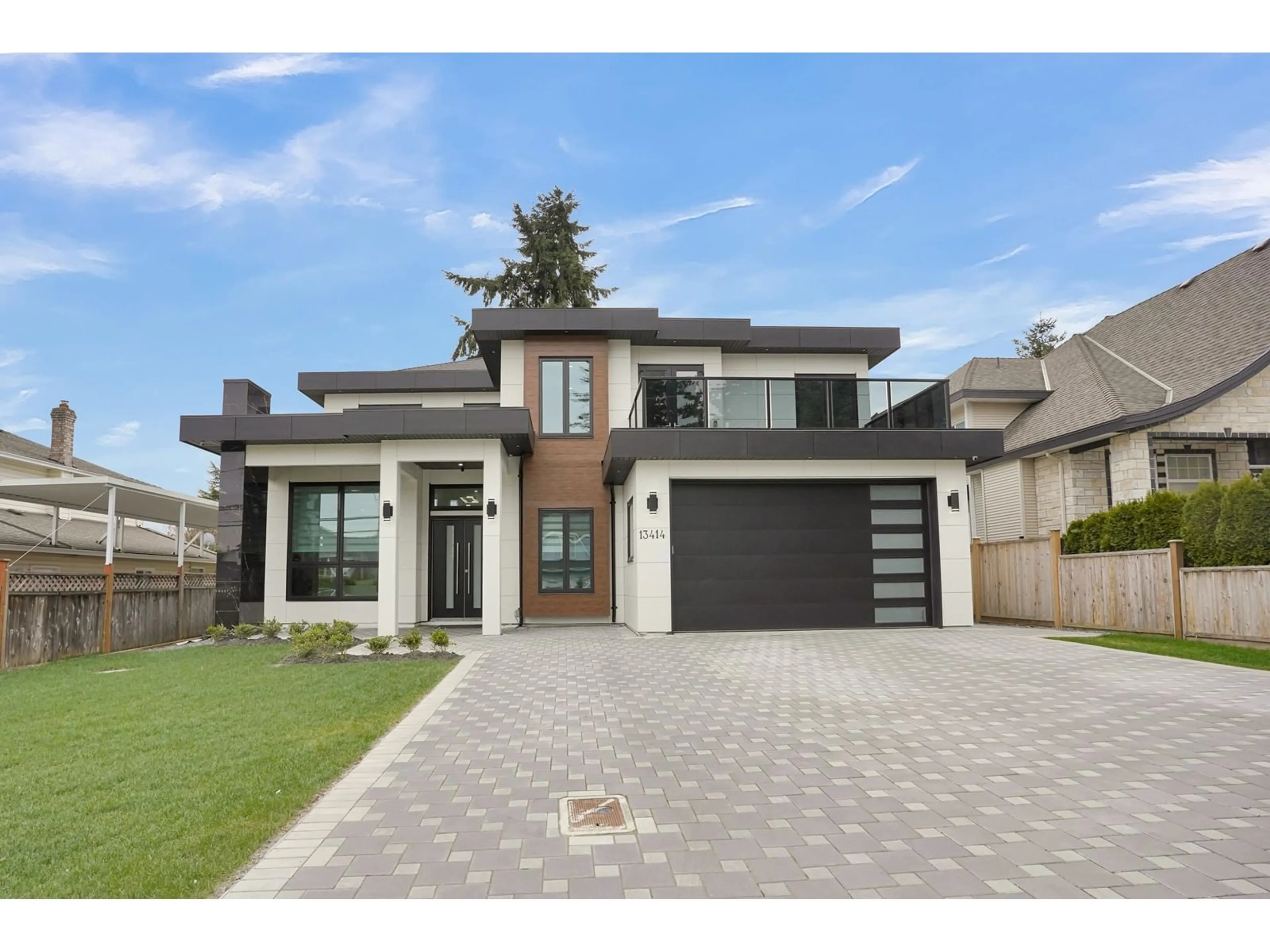 Frontside or backside of a home for 13414 60 AVENUE, Surrey British Columbia V3X2M3